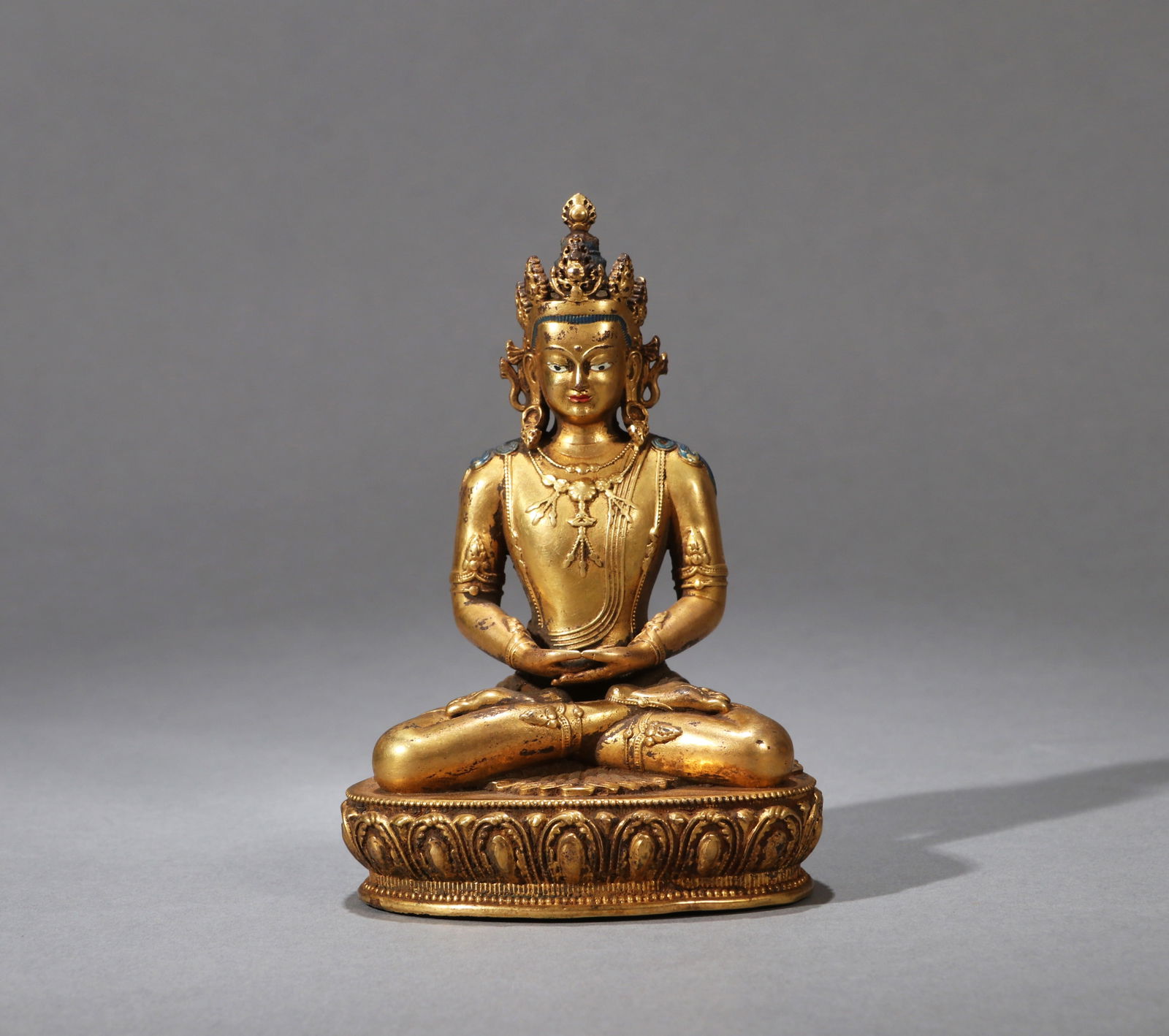 A GILT-BRONZE FIGURE OF TARA: A GILT-BRONZE FIGURE OF TARA Height: 10 cm (3.94 in.). All measurements are approximate.