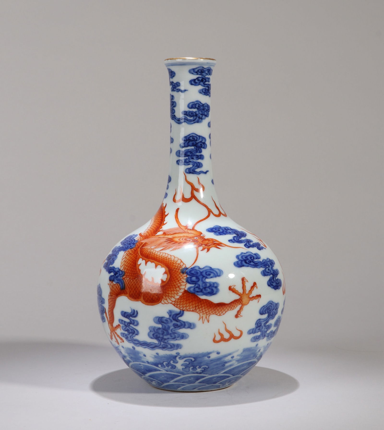 A BLUE AND WHITE AND IRON-RED 'CLOUD AND DRAGON' SMALL GLOBULAR VASE (1 of 6)