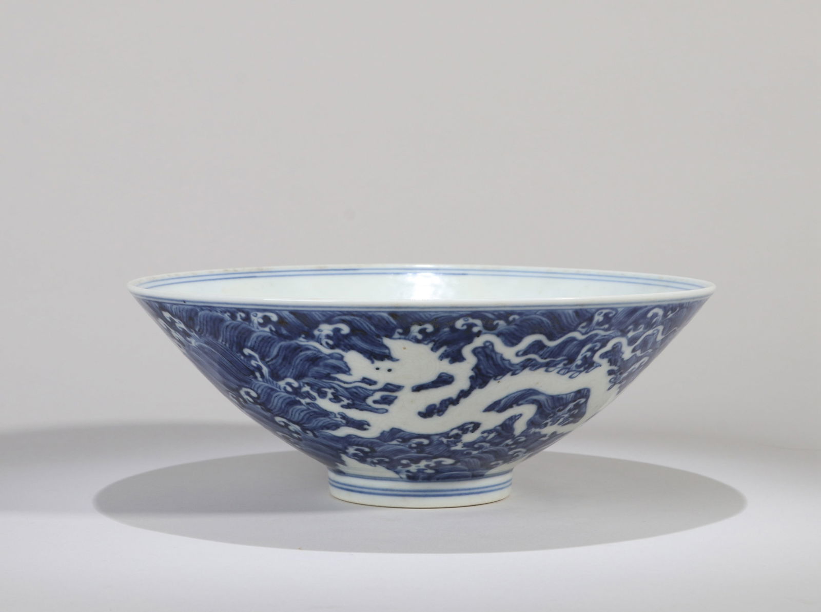 A BLUE AND WHITE 'SANSKRIT' LARGE CONICAL BOWL (1 of 7)