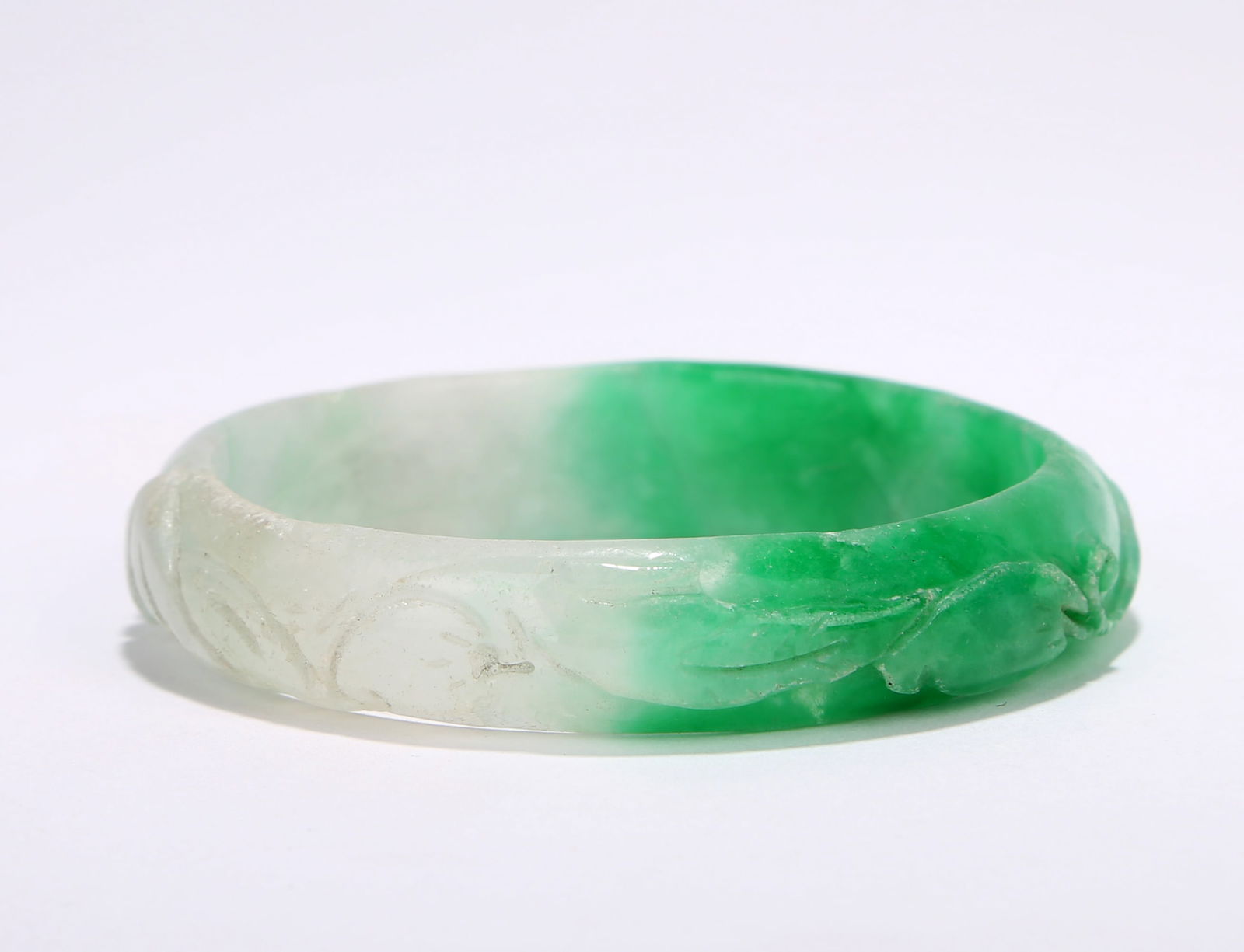 A 'FLOWERS' BRACELET: A 'FLOWERS' BRACELET Inner Diameter: 5.4 cm (2.13 in.). All measurements are approximate.