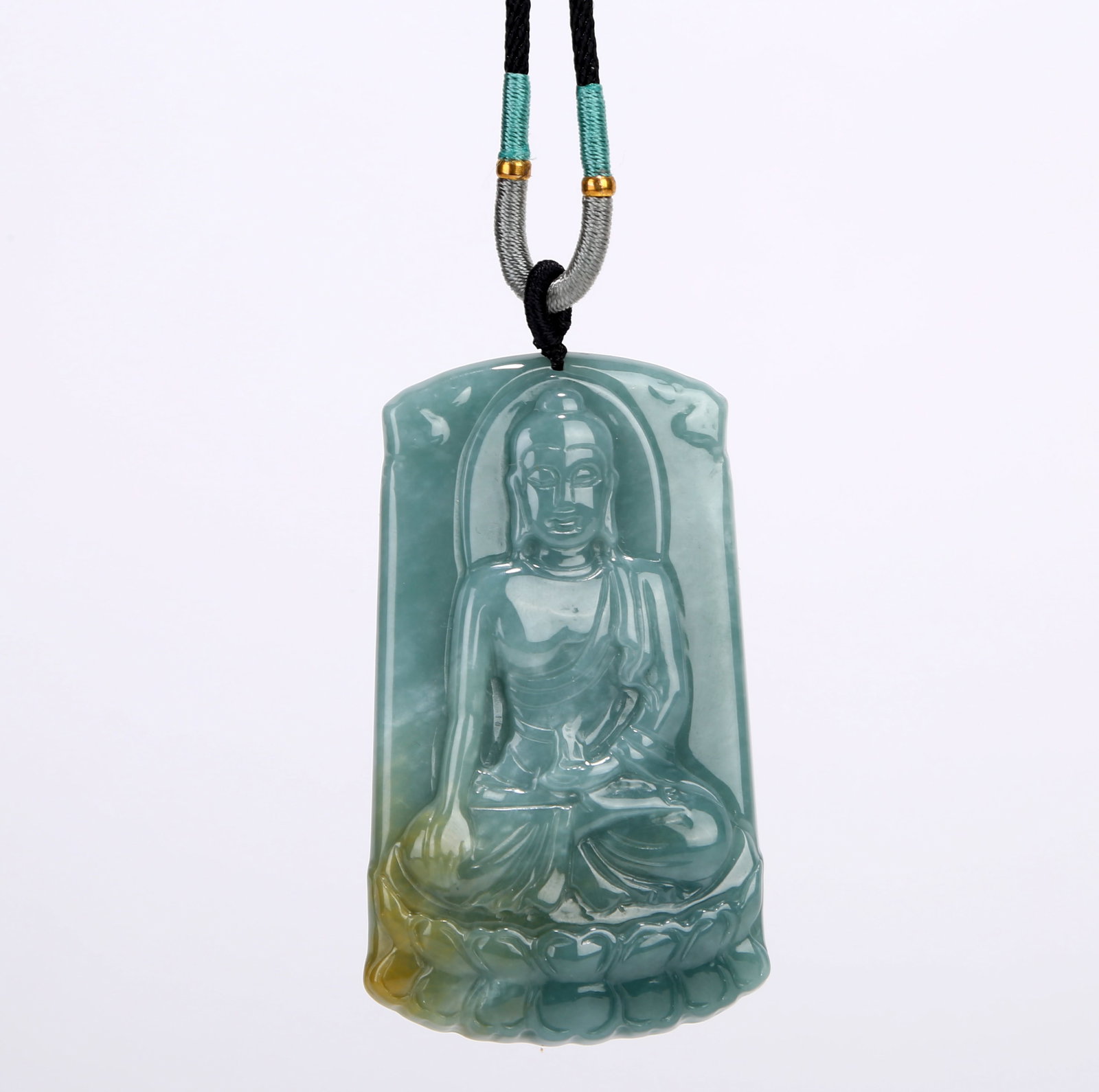 A GUANYIN PENDANT: A GUANYIN PENDANT Height: 68.8 mm (2.71 in.). All measurements are approximate.