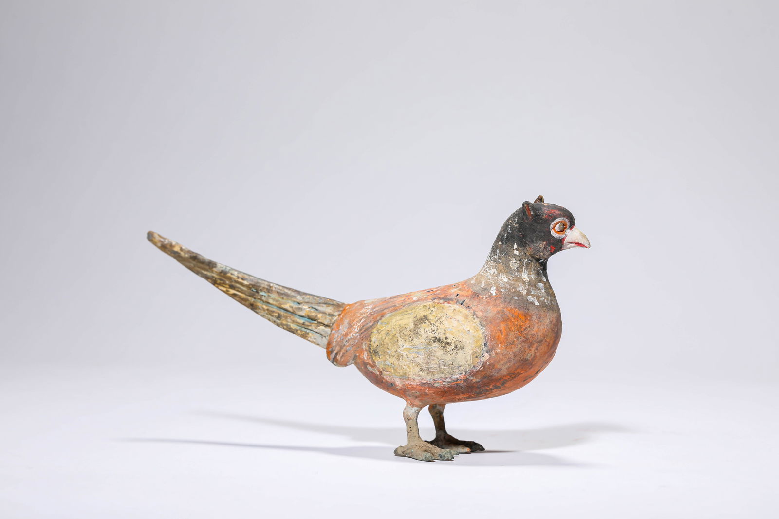 A PAINTED POTTERY BIRD - 3
