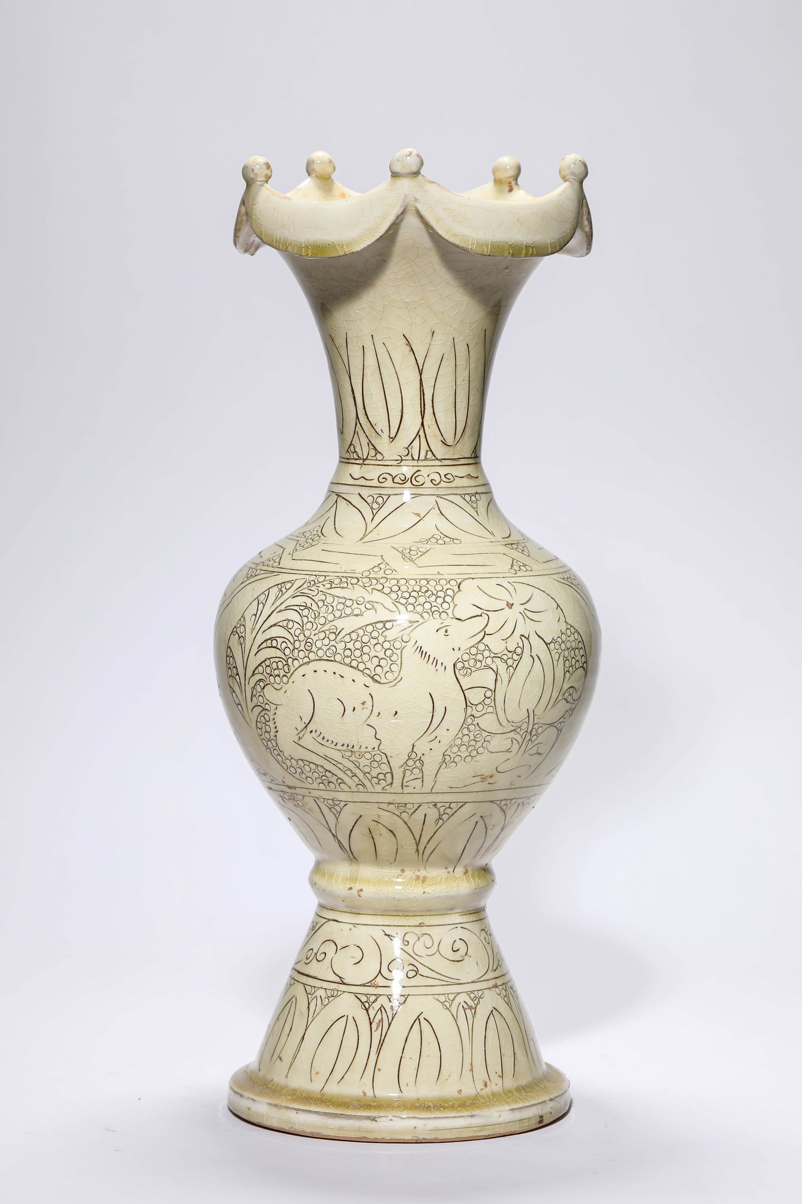 A CIZHOU-TYPE 'CARVED FLORAL'VASE: A CIZHOU-TYPE 'CARVED FLORAL'VASE Dimensions: Width: 17.8 cm (7.01 in) x Height: 43.8 cm (17.24 in). All measurements are approximate.