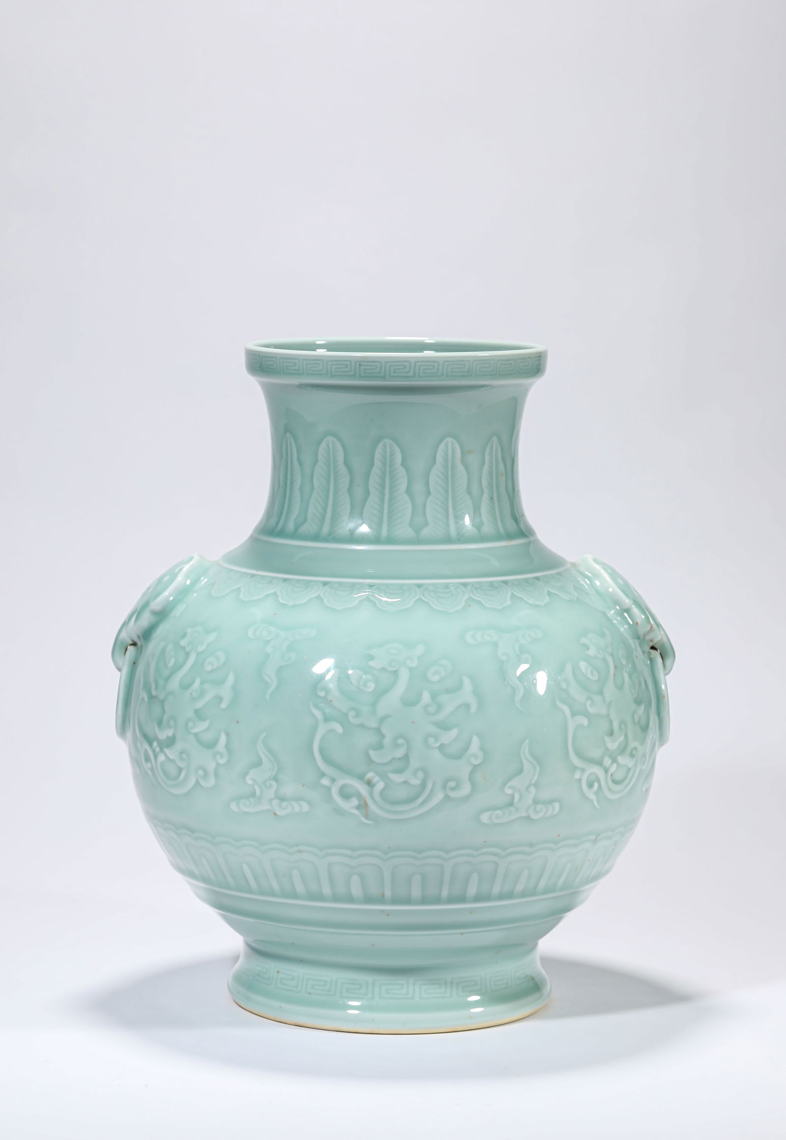 A BEAN-GREEN-GLAZED ZUN: A BEAN-GREEN-GLAZED ZUN Dimensions: Length: 26.0 cm (10.24 in) x Width: 24.6 cm (9.69 in) x Height: 31.0 cm (12.20 in). All measurements are approximate.