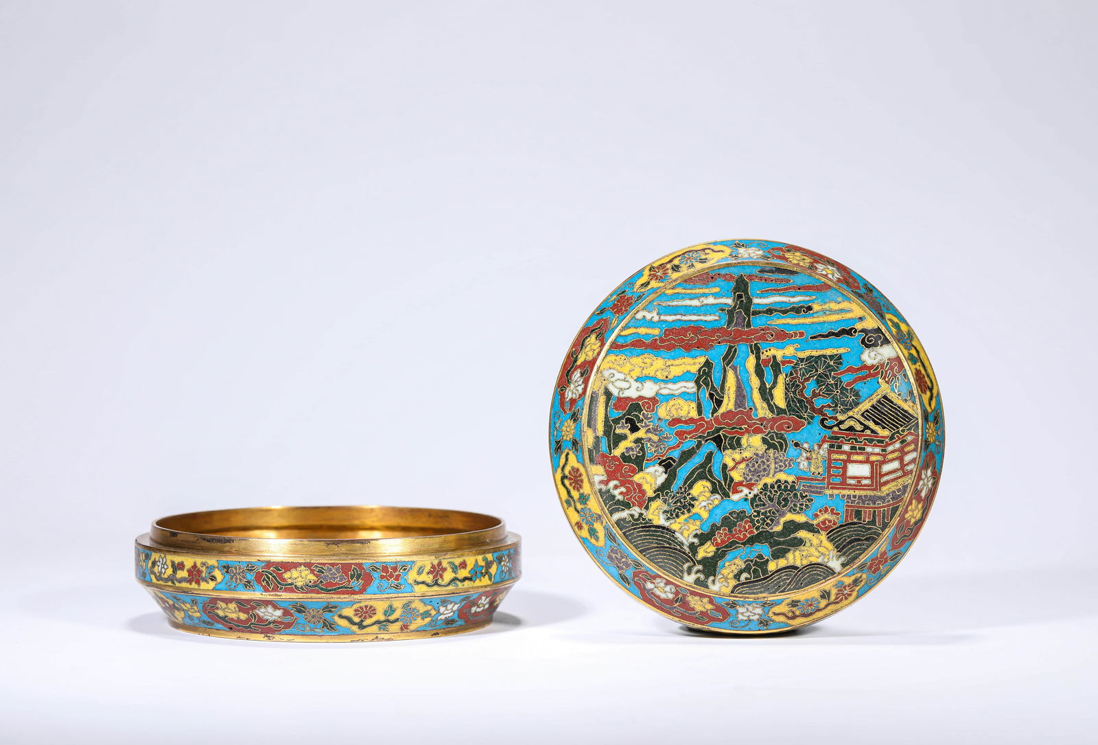 A CLOISONNé ENAMEL 'LANDSCAPE AND FIGURES' COVERED BOX: A CLOISONNé ENAMEL 'LANDSCAPE AND FIGURES' COVERED BOX Dimensions: Weight: 766g. Width: 13.4 cm (5.28 in) x Height: 5.6 cm (2.20 in). All measurements are approximate.