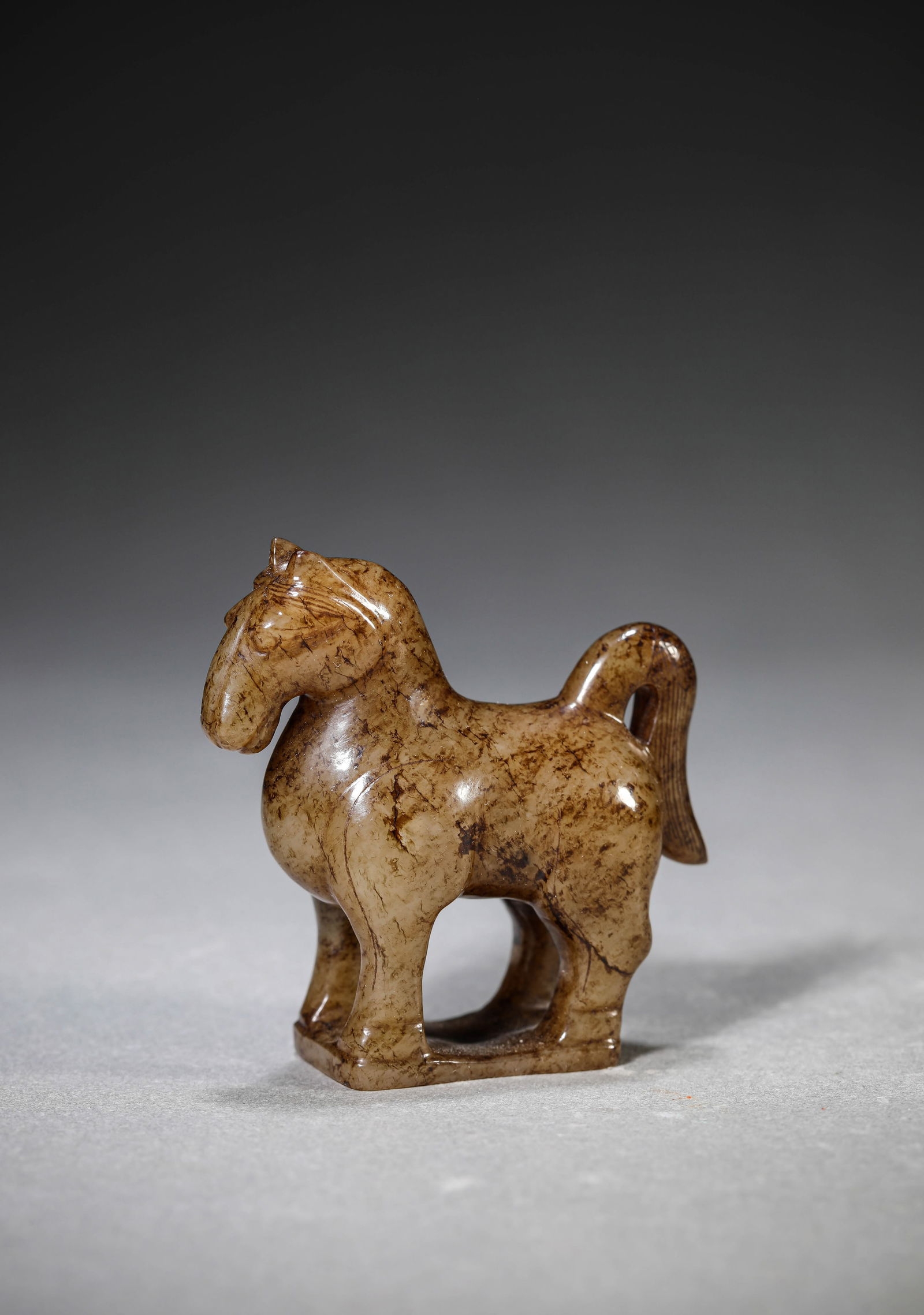 A JADE HORSE: A JADE HORSE Dimensions: Length: 6.0 cm (2.36 in) x Width: 2.5 cm (0.98 in) x Height: 6.1 cm (2.40 in). All measurements are approximate.