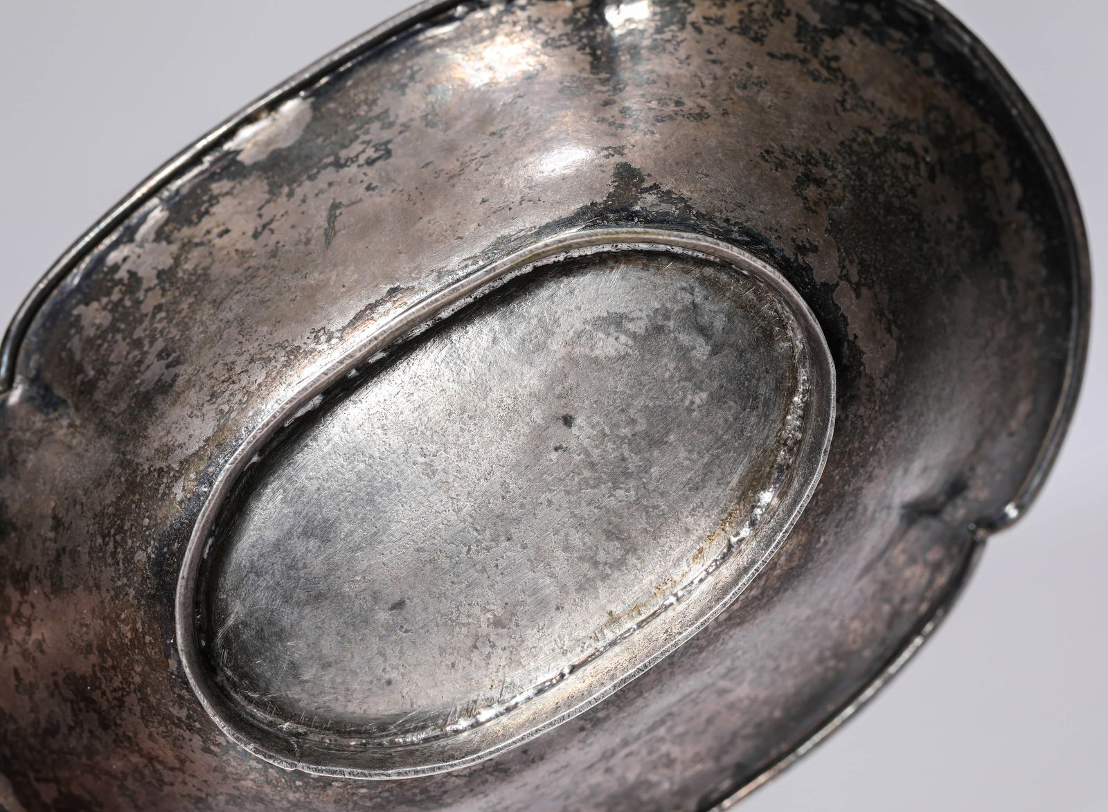 A SILVER 'ENGRAVED DEER' DISH - 6