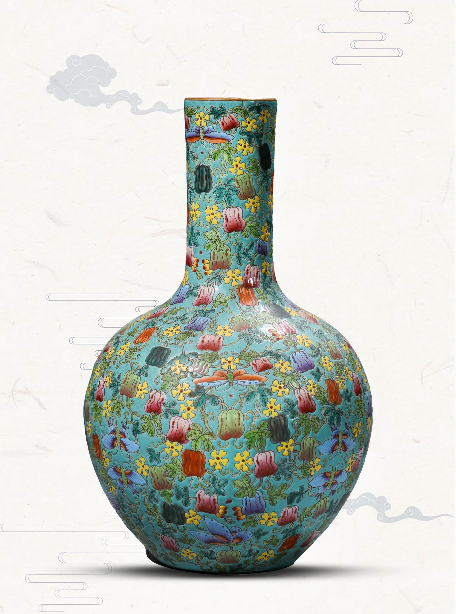 A FAMILLE-ROSE 'MELON OF GOOD FORTUNE' CORAL-GROUND BOTTLE VASE: A FAMILLE-ROSE 'MELON OF GOOD FORTUNE' CORAL-GROUND BOTTLE VASE Dimensions: Width: 24.5 cm (9.65 in) x Height: 39.5 cm (15.55 in). All measurements are approximate.