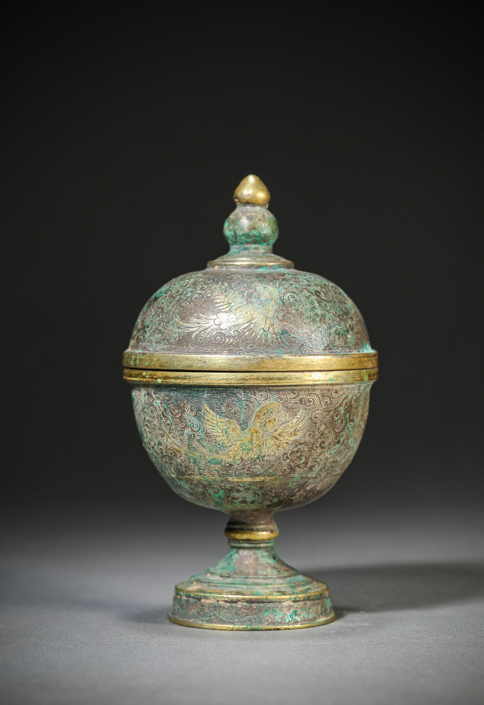 A SILVER 'PHOENIX' DOU: A SILVER 'PHOENIX' DOU Dimensions: Weight: 377g. Width: 7.3 cm (2.87 in) x Height: 12.8 cm (5.04 in). All measurements are approximate.