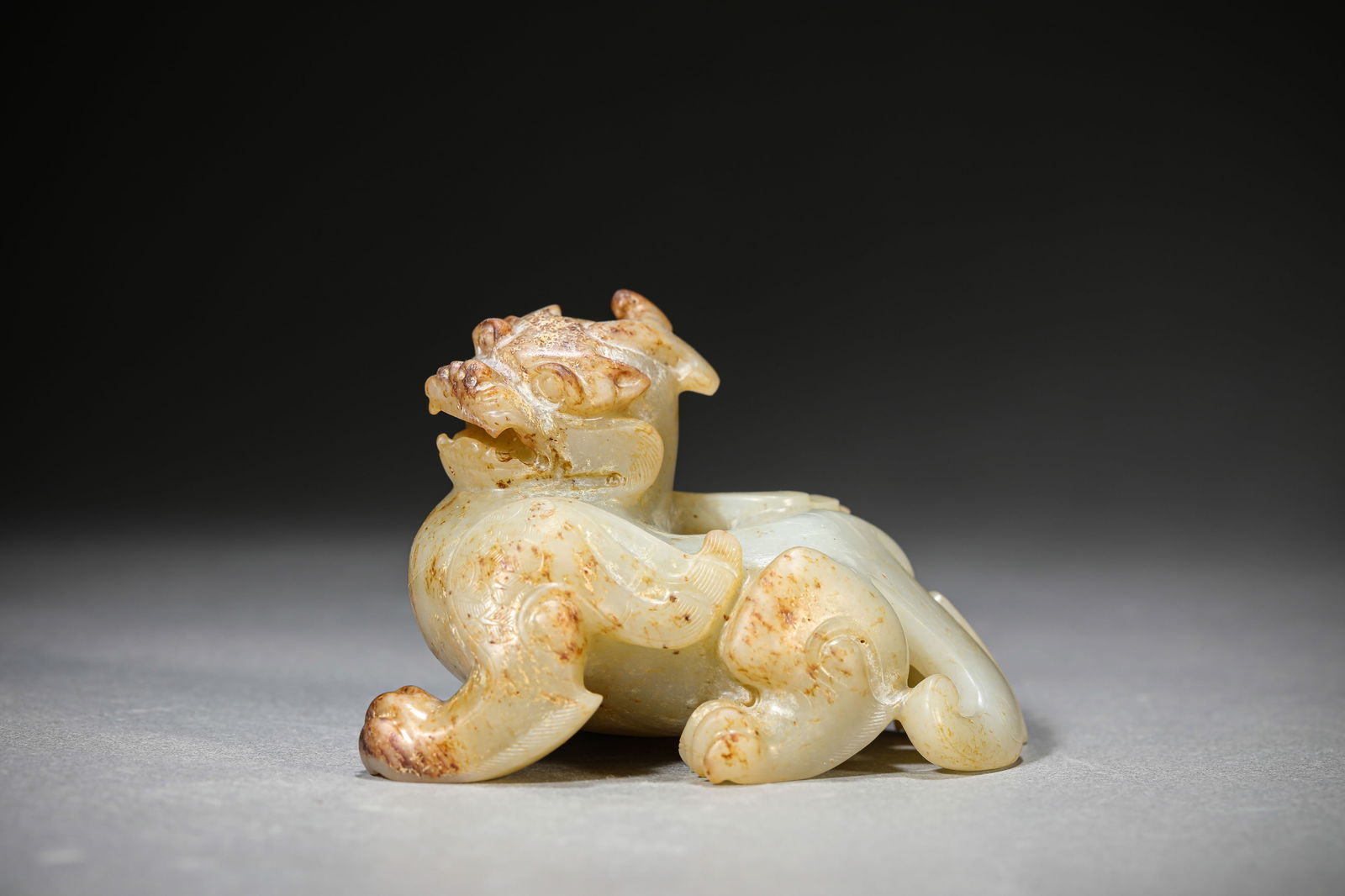 A JADE 'CHI-DRAGON' ORNAMENT (1 of 5)