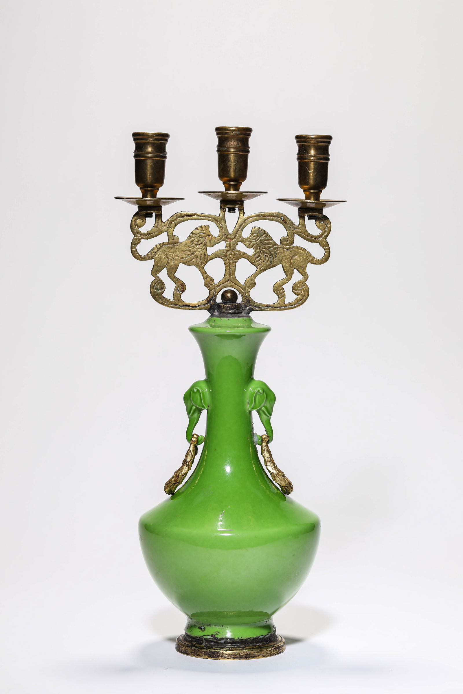 A GREEN-GLAZED 'ELEPHANT-HEAD HANDLES' VASE CANDLEHOLDER (1 of 3)