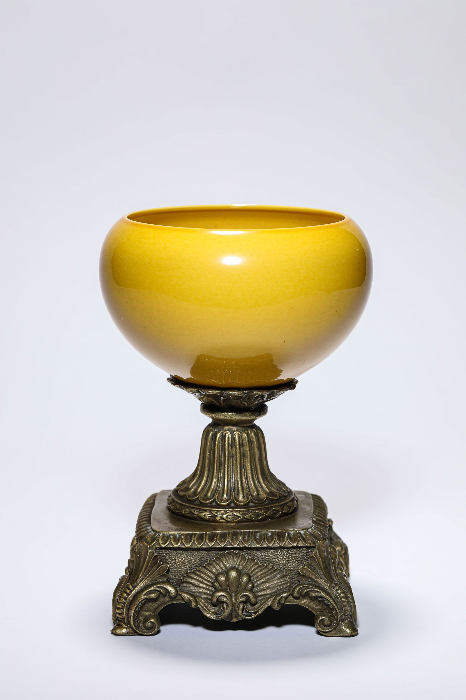 A YELLOW-GLAZED BOWL: A YELLOW-GLAZED BOWL Dimensions: Width: 13.1 cm (5.16 in) x Height: 19.2 cm (7.56 in). All measurements are approximate.