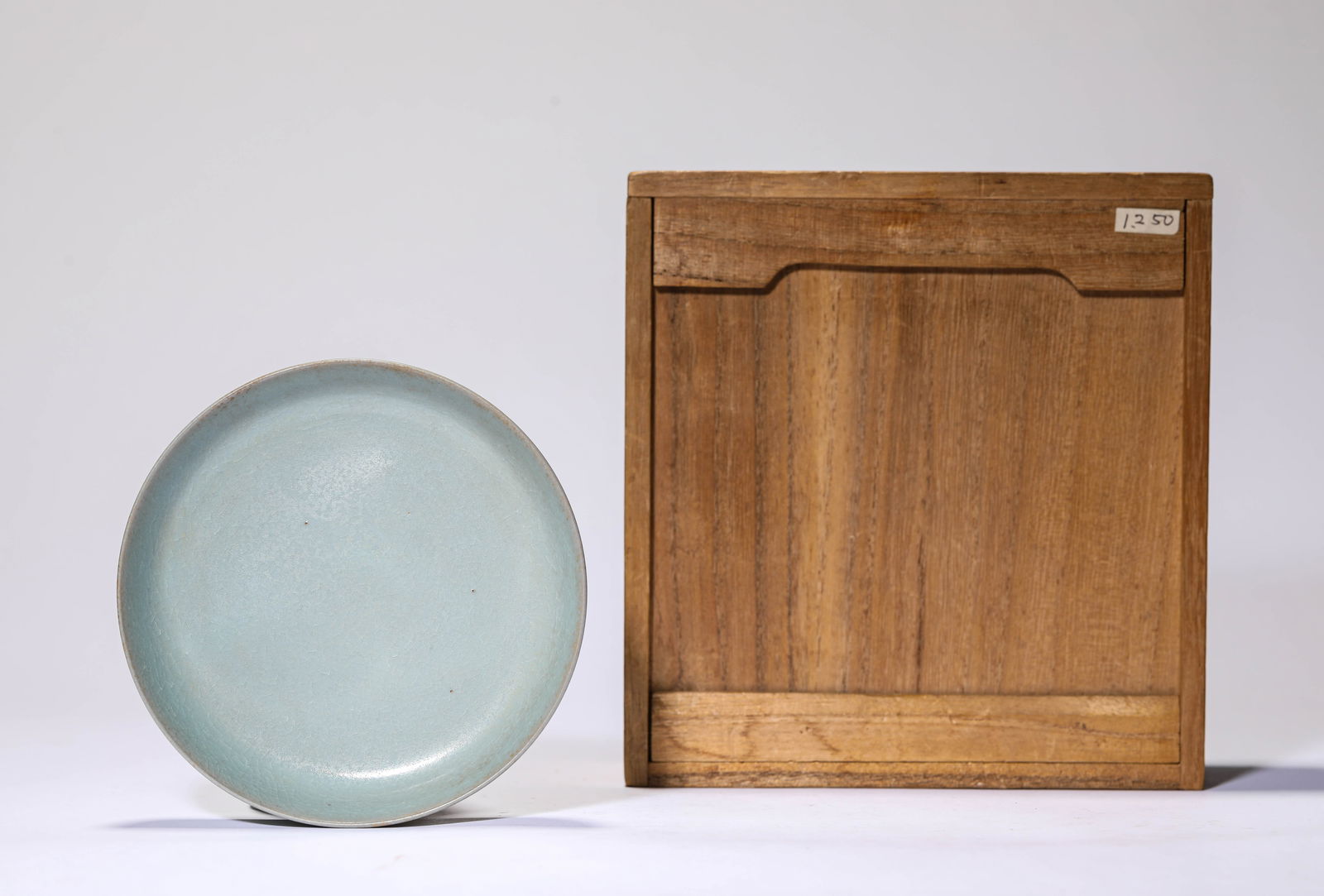 A RU-TYPE DISH: A RU-TYPE DISH Dimensions: Width: 12.0 cm (4.72 in) x Height: 2.0 cm (0.79 in). All measurements are approximate.