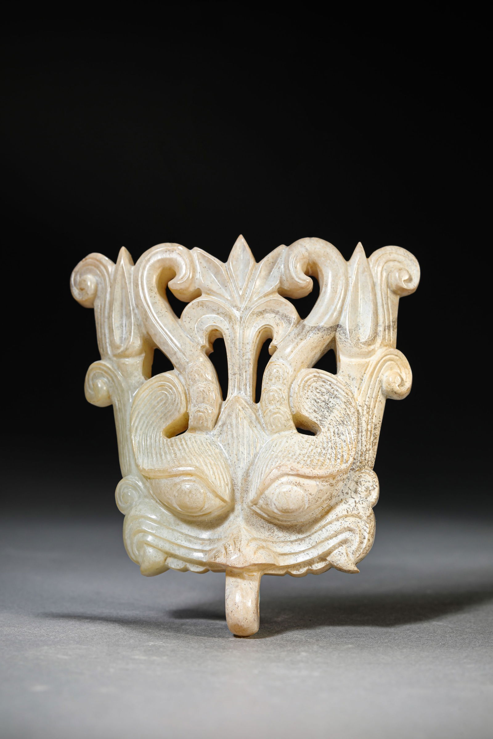 A JADE 'PUSHOU' DOOR HANDLE: A JADE 'PUSHOU' DOOR HANDLE Dimensions: Width: 9.5 cm (3.74 in) x Height: 10.8 cm (4.25 in). All measurements are approximate.