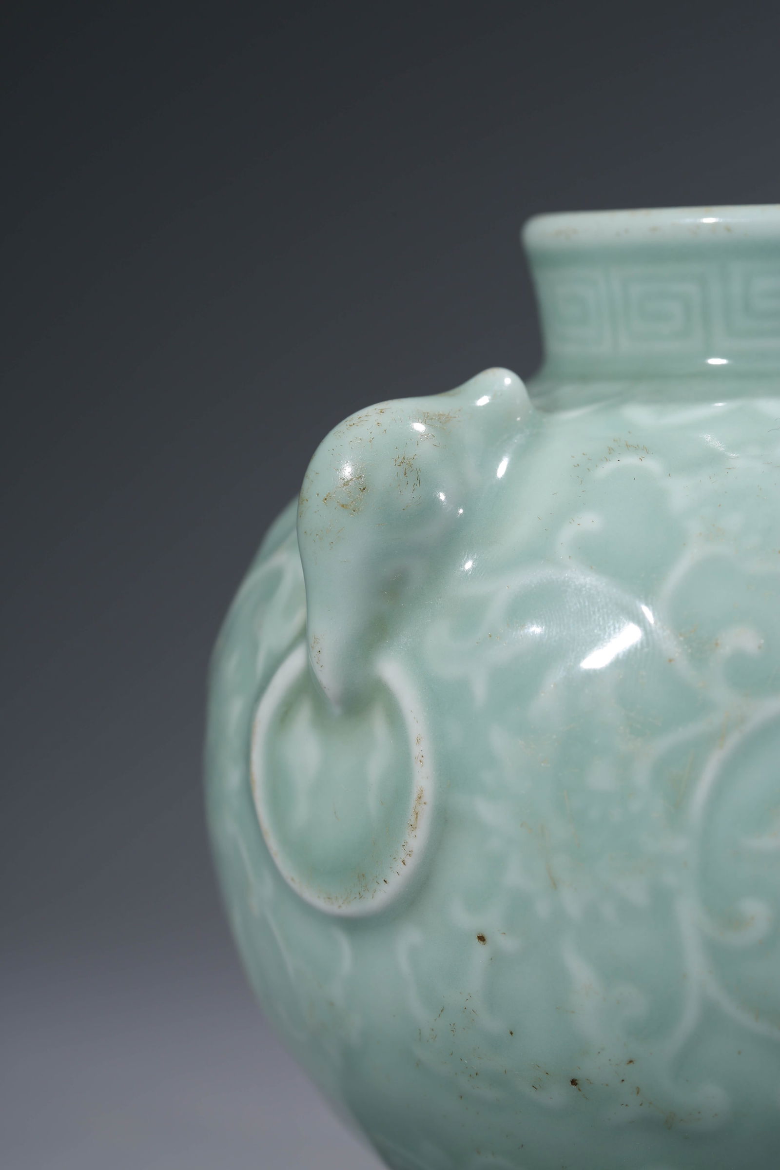A CELADON-GLAZED 'RELIEF-DECORATED' JAR - 4
