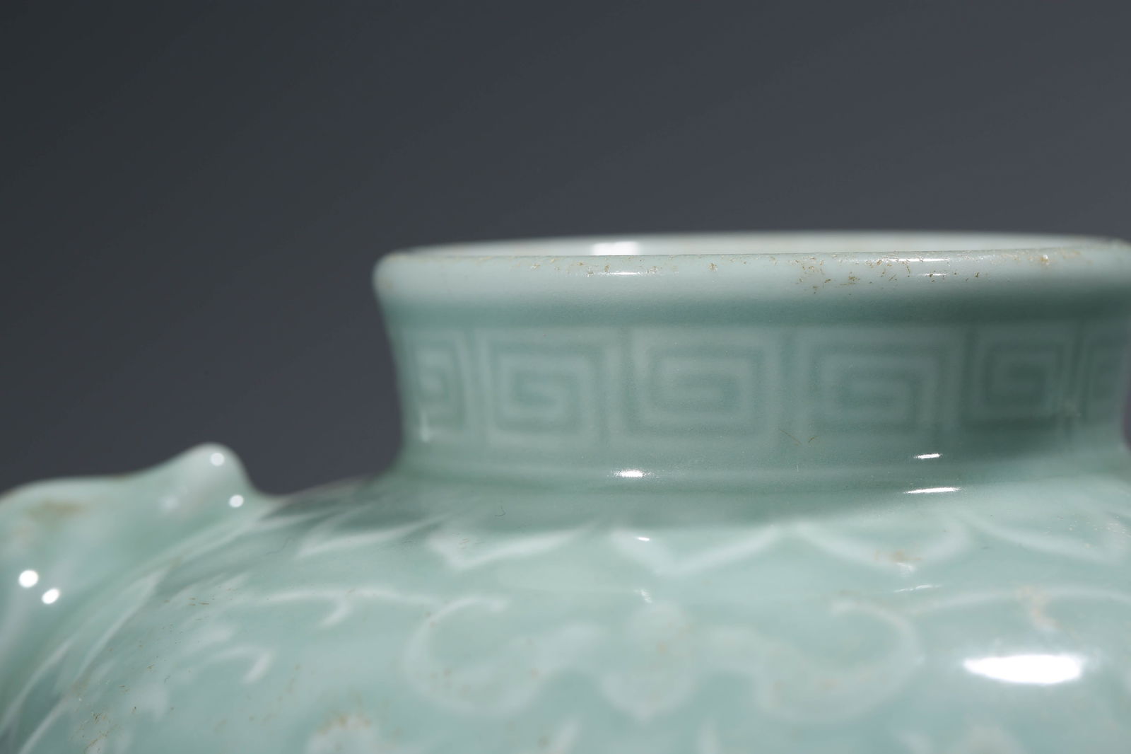 A CELADON-GLAZED 'RELIEF-DECORATED' JAR - 6