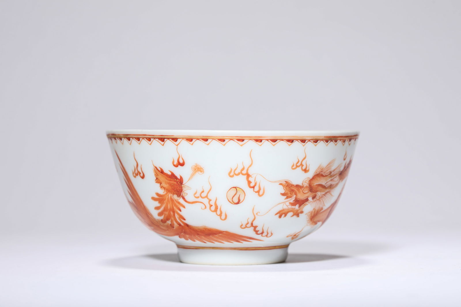 AN IRON-RED 'DRAGON AND PHOENIX' BOWL (1 of 5)