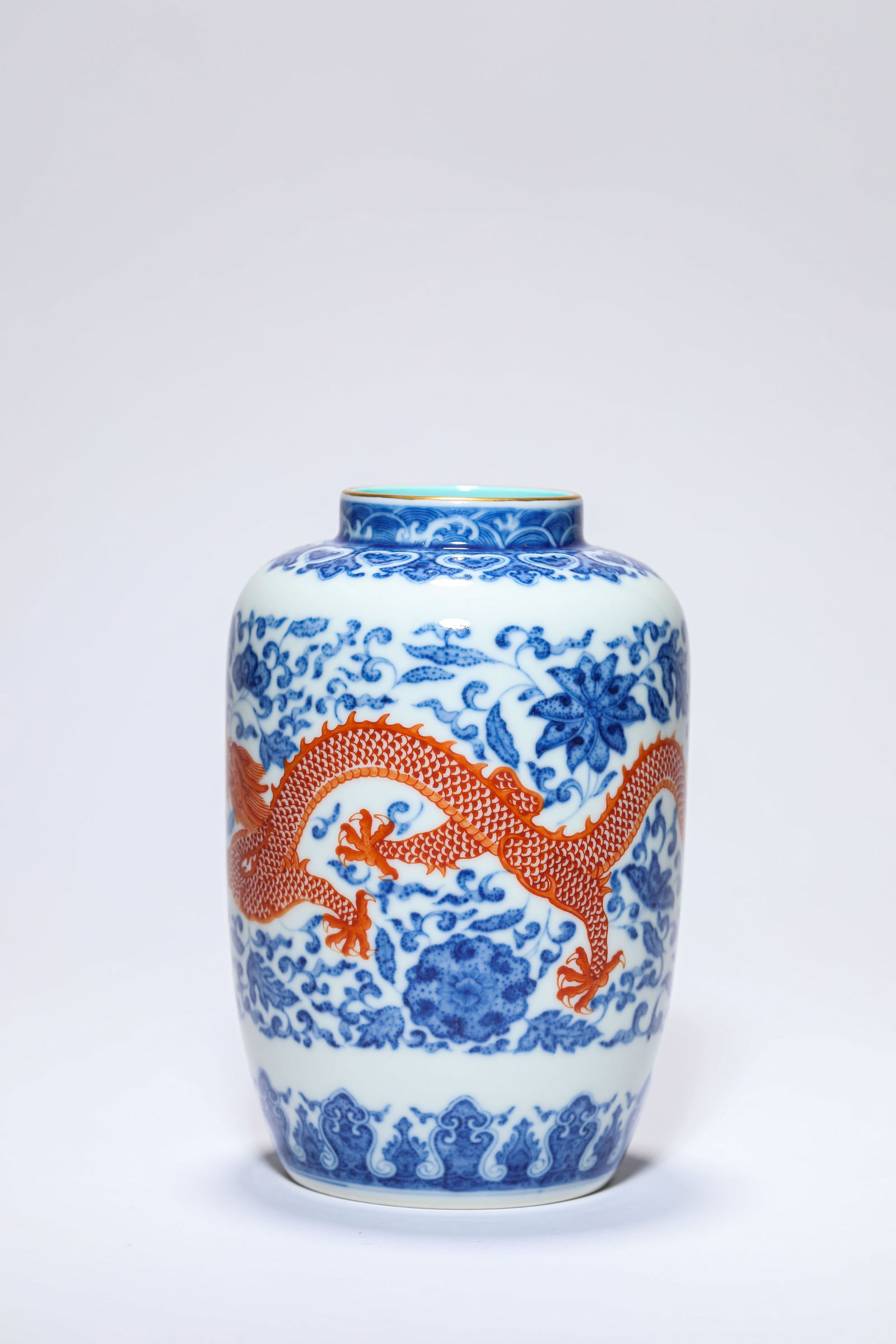 A BLUE AND WHITE AND IRON-RED 'DRAGON' VASE: A BLUE AND WHITE AND IRON-RED 'DRAGON' VASE Dimensions: Width: 9.5 cm (3.74 in) x Height: 14.0 cm (5.51 in). All measurements are approximate.