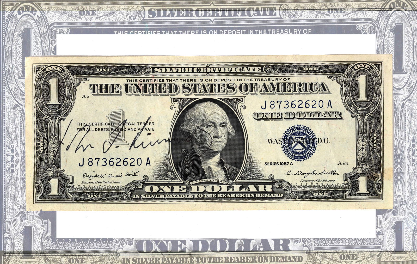JOHN F. KENNEDY (1917-1963) - SIGNED $1 SILVER CERTIFICATE (SERIES 1957 A): JOHN F. KENNEDY (1917-1963) - SIGNED $1 SILVER CERTIFICATE (SERIES 1957 A)Provenance and Authenticity:This item includes a certificate of authenticity. United States $1 Silver Certificate, Series