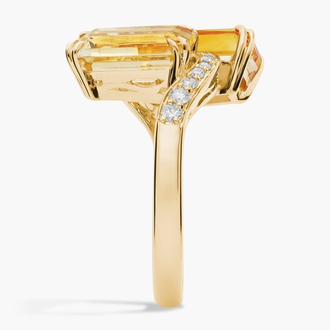 EMERALD CUT CITRINE AND DIAMOND TWO-STONE TOI ET MOI RING IN 14K YELLOW GOLD: EMERALD CUT CITRINE AND DIAMOND TWO-STONE TOI ET MOI RING IN 14K YELLOW GOLDDescription:This exquisite yellow gold two-stone ring features two stunning emerald cut citrine gemstones adorned with