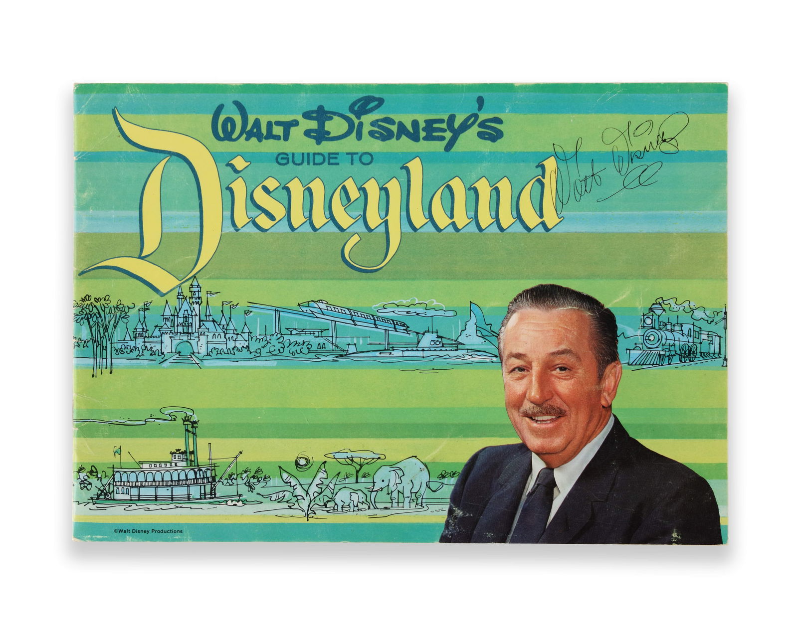 WALT DISNEY - HAND-SIGNED WALT DISNEY'S GUIDE TO DISNEYLAND (GREEN STRIPED EDITION): WALT DISNEY - HAND-SIGNED WALT DISNEY'S GUIDE TO DISNEYLAND (GREEN STRIPED EDITION) Provenance and Authenticity: This item includes a certificate of authenticity. This vintage copy of Walt Disney's Gu