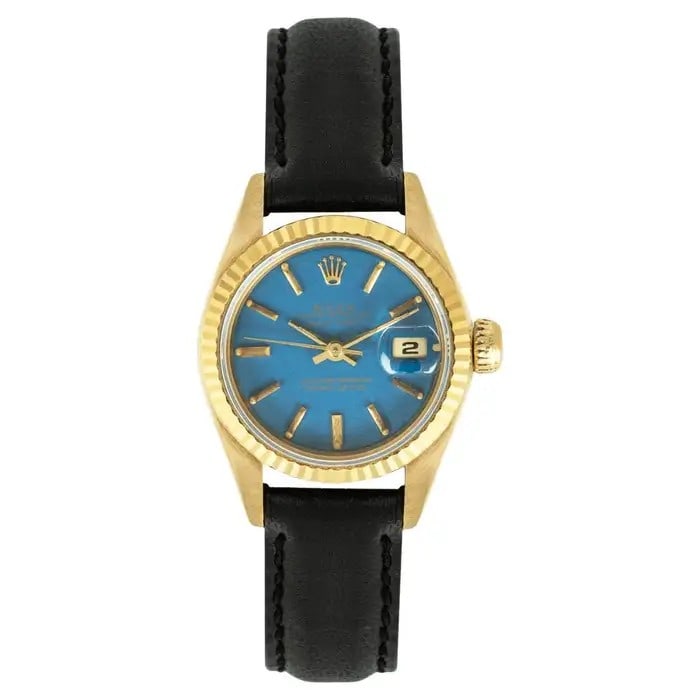 ROLEX DATEJUST RARE BLUE STELLA DIAL 69178: ROLEX DATEJUST RARE BLUE STELLA DIAL 69178Description:This Rolex Datejust watch features a 26mm gold case, paired with a rare blue Stella dial and a gold triangular bezel. Please note that there is a