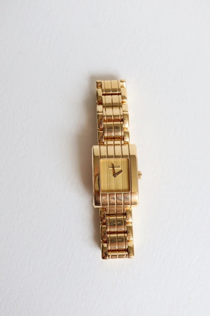 BOUCHERON PARALLEL COLLECTION WATCH, 18K GOLD, DECORATED WITH RAISED PATTERNS: BOUCHERON PARALLEL COLLECTION WATCH, 18K GOLD, DECORATED WITH RAISED PATTERNSDescription:The case and strap are crafted from 18K gold, with a rich gold color and a heavy texture, reflecting