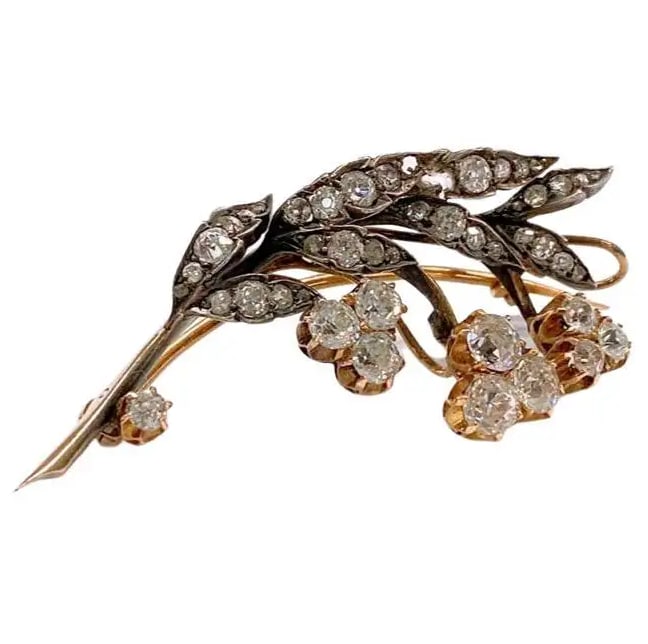 ANTIQUE 1880S LILY OF THE VALLEY OLD MINE CUT DIAMOND RUSSIAN GOLD BROOCH: ANTIQUE 1880S LILY OF THE VALLEY OLD MINE CUT DIAMOND RUSSIAN GOLD BROOCHDescription:An antique Russian hyacinth brooch, set with old mine-cut diamonds, with an estimated diamond weight of 4 carats,