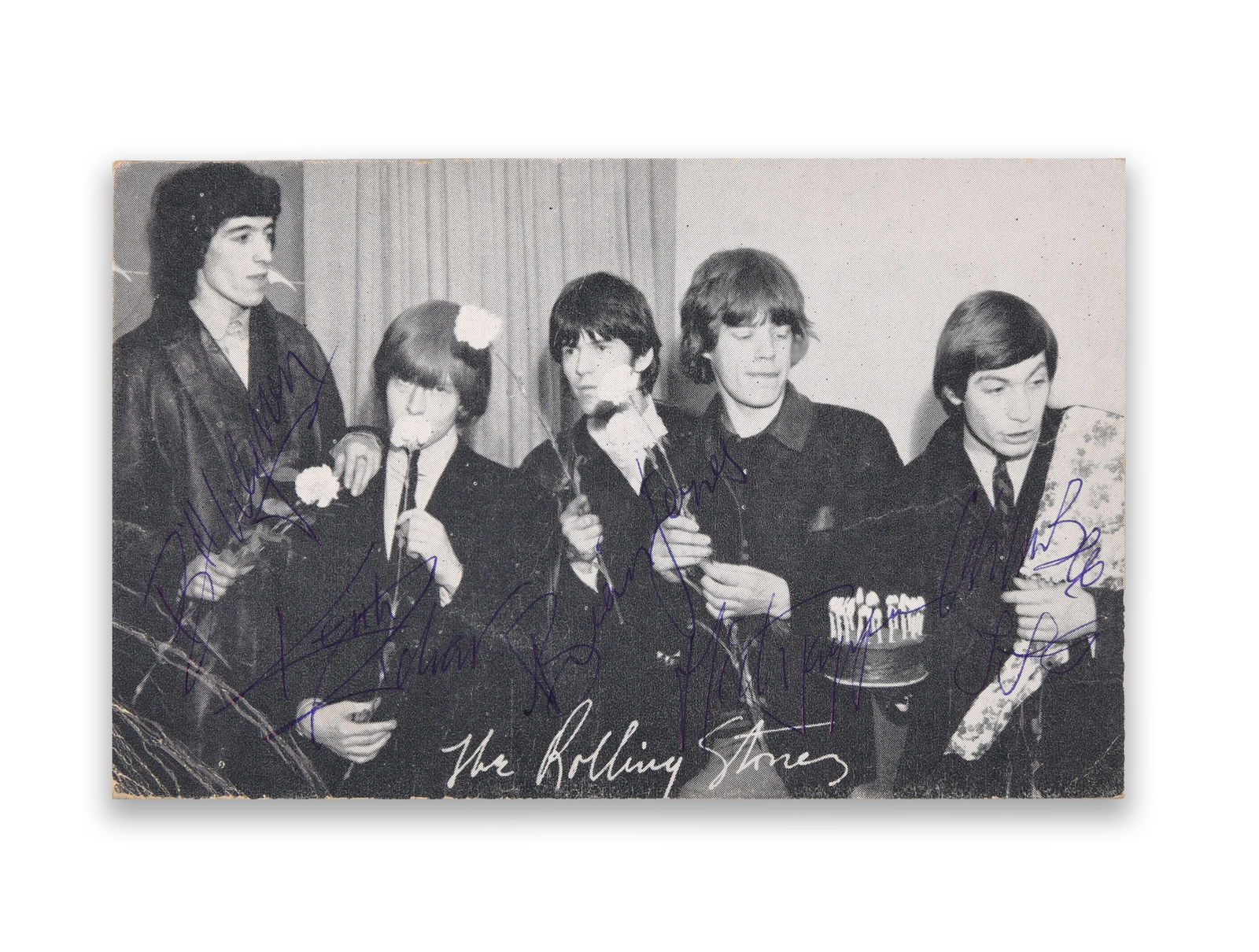 THE ROLLING STONES, MULTI-SIGNED PHOTOGRAPH POSTCARD BY THE ORIGINAL FIVE MEMBERS, CIRCA EARLY–MID: THE ROLLING STONES, MULTI-SIGNED PHOTOGRAPH POSTCARD BY THE ORIGINAL FIVE MEMBERS, CIRCA EARLY–MID 1960S Provenance and Authenticity: This item includes a certificate of authenticity. This photograp