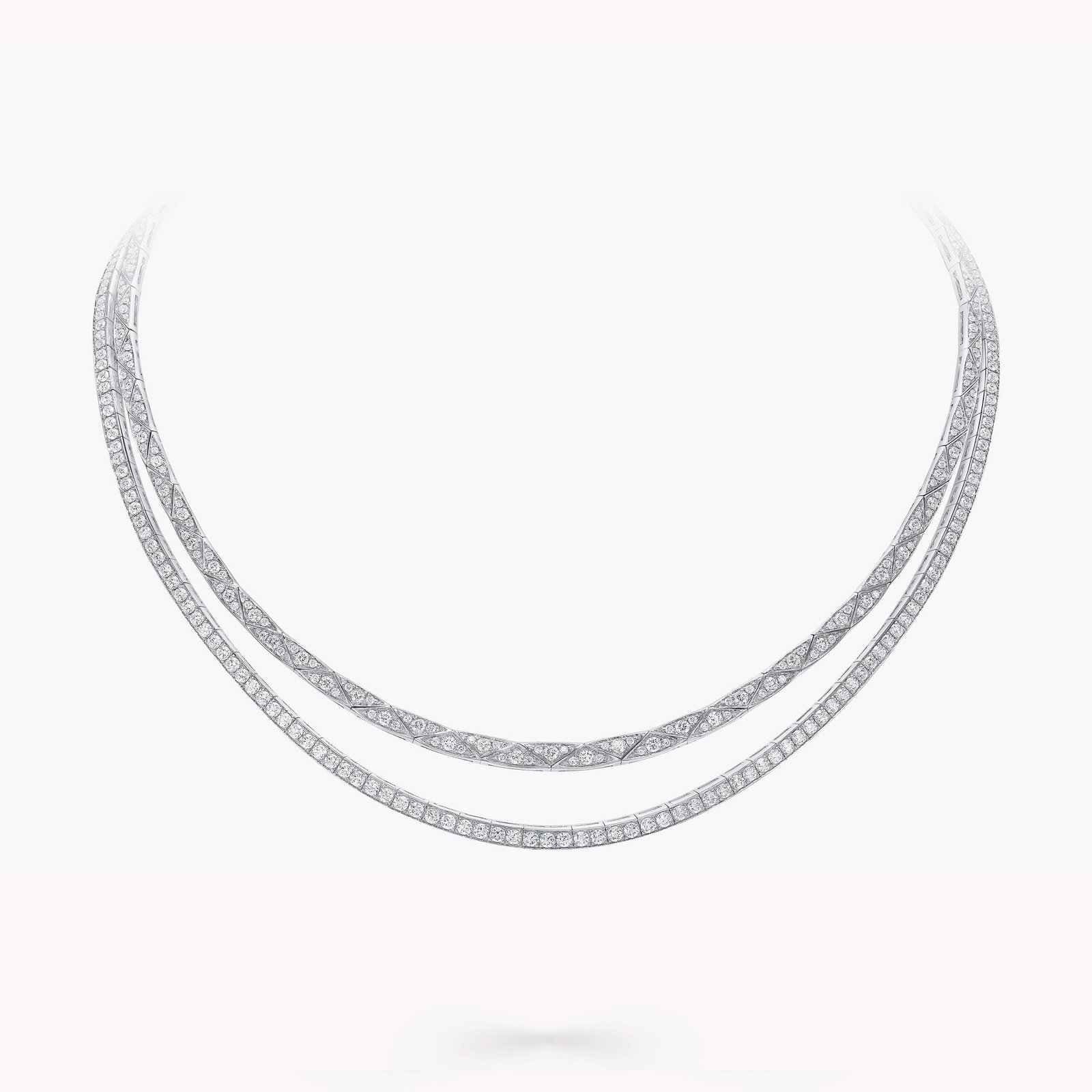 DIAMOND DOUBLE ROW COLLAR NECKLACE: DIAMOND DOUBLE ROW COLLAR NECKLACEDescription:The lot consists of a rigid collar-style necklace set with numerous brilliant-cut diamonds arranged in two elegant rows forming a sweeping curved