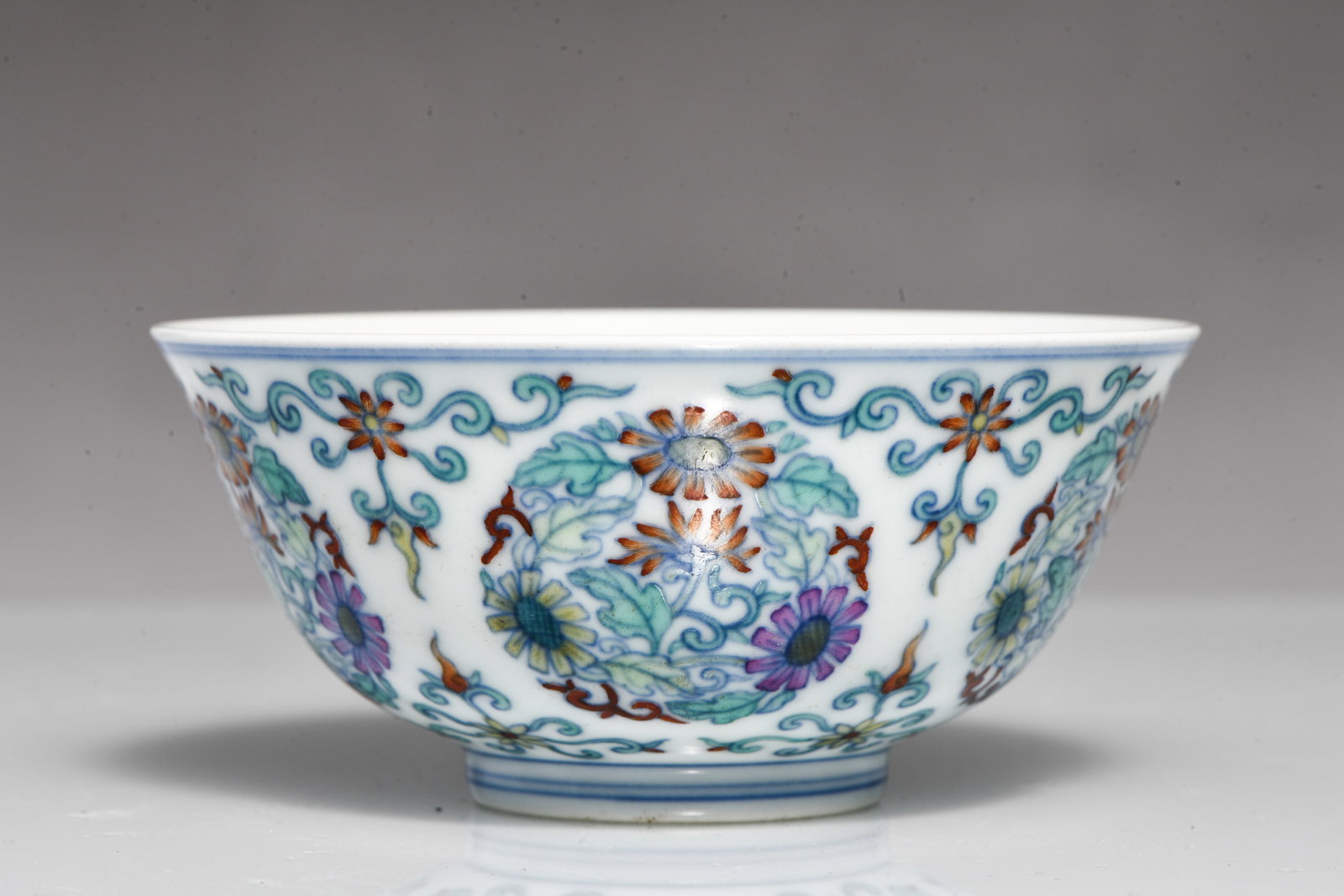CELADON-GLAZED BOWL WITH CLUSTERED CHRYSANTHEMUMS PATTERN, MADE IN THE YEAR OF THE QIANLONG REIGN OF (1 of 3)