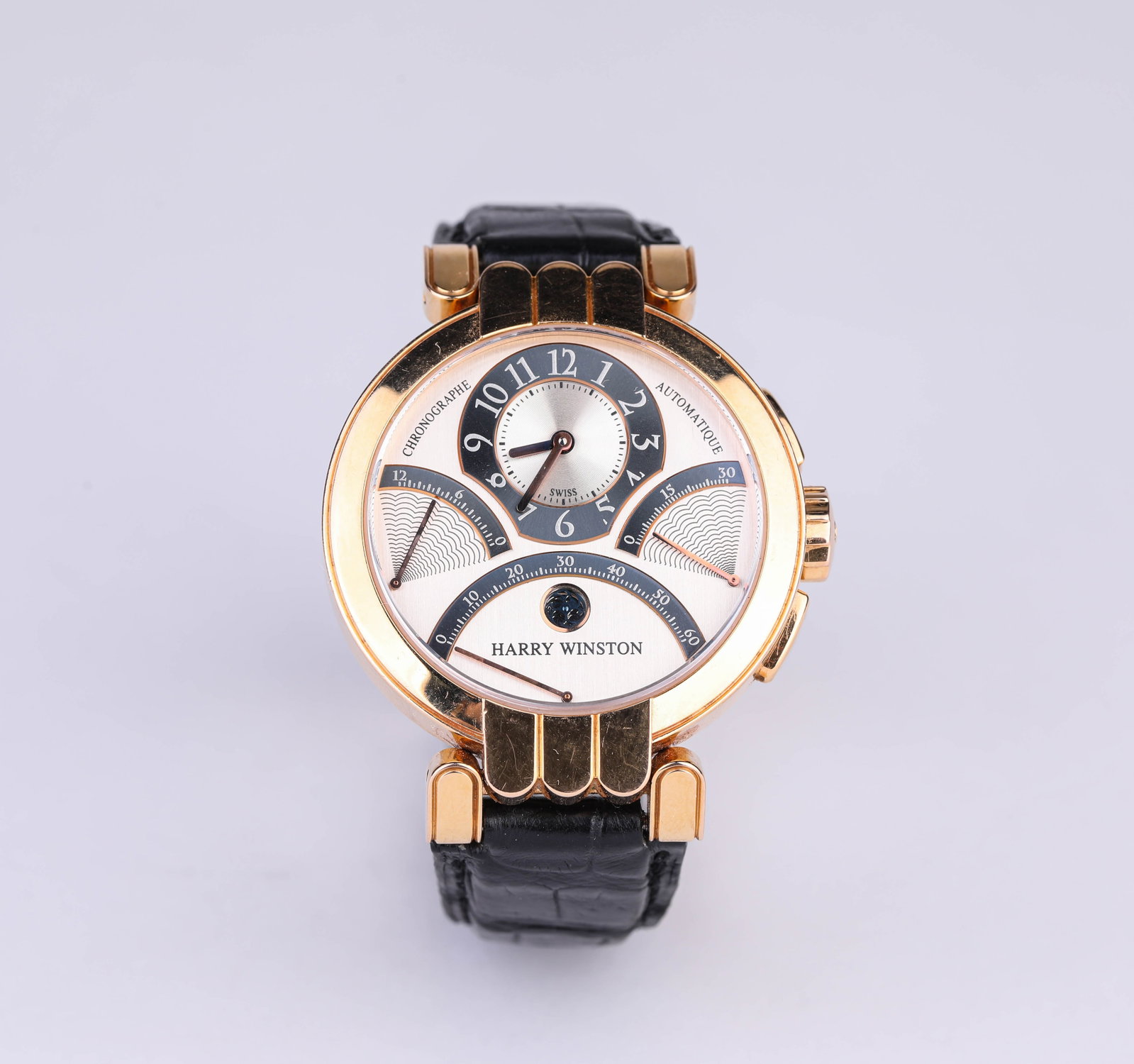A HARRY WINSTON 18K GOLD AUTOMATIC MECHANICAL WRISTWATCH: A HARRY WINSTON 18K GOLD AUTOMATIC MECHANICAL WRISTWATCH Dimensions: Width: 4.2 cm (1.65 in). All measurements are approximate.