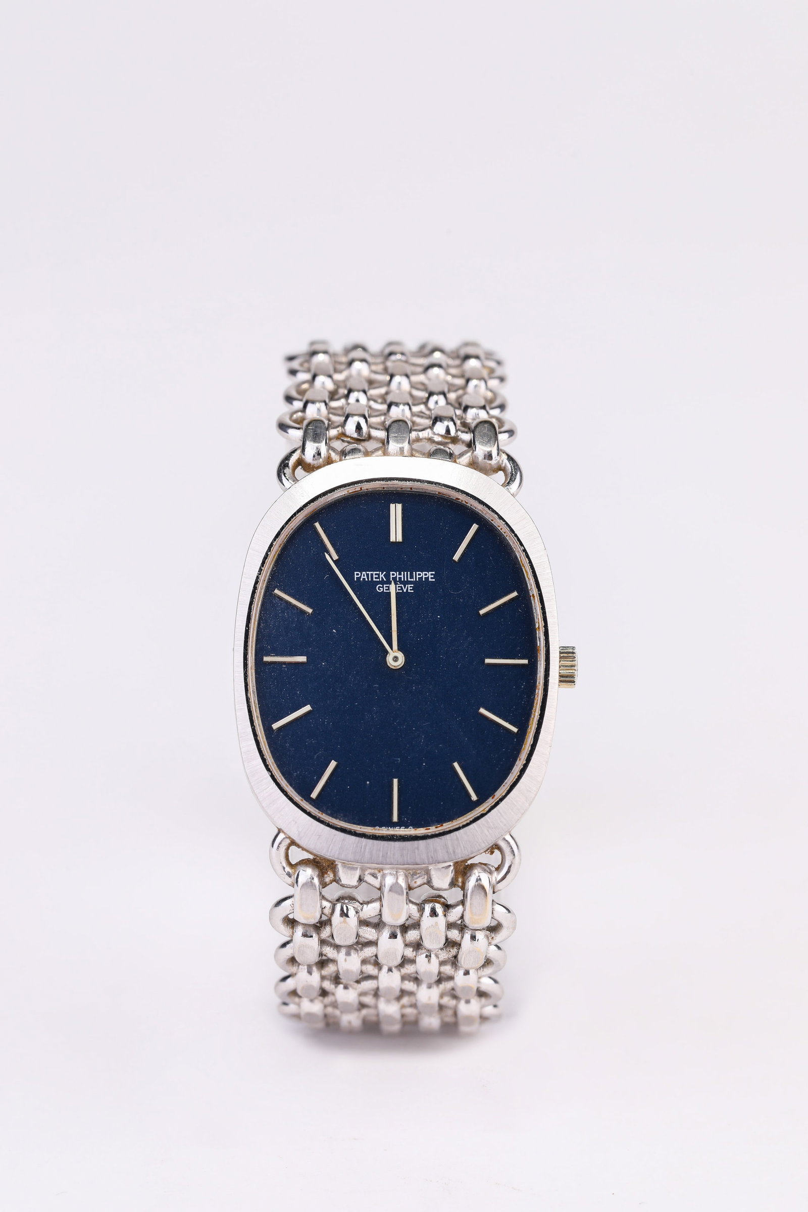 A PATEK PHILIPPE 18K WHITE GOLD MANUAL-WIND WRISTWATCH: A PATEK PHILIPPE 18K WHITE GOLD MANUAL-WIND WRISTWATCH Dimensions: Length: 3.4 cm (1.34 in) x Width: 2.8 cm (1.10 in). All measurements are approximate.