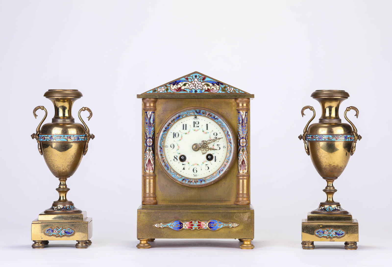 A FRENCH GILT-BRONZE AND ENAMEL MANTEL CLOCK: A FRENCH GILT-BRONZE AND ENAMEL MANTEL CLOCK Dimensions: Weight: 5361g. Length: 16.4 cm (6.46 in) x Width: 11.8 cm (4.65 in) x Height: 24.8 cm (9.76 in). Weight: 1386g. Length: 8.0 cm (3.15 in) x Widt