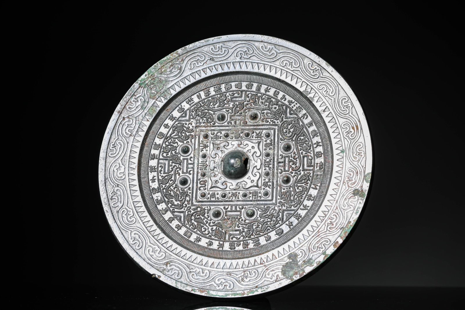 A BRONZE 'SHANGFANG' 'ANIMALS AND ANTIQUITIES' MIRROR: A BRONZE 'SHANGFANG' 'ANIMALS AND ANTIQUITIES' MIRROR Dimensions: Weight: 800g. Width: 18.1 cm (7.13 in) x Height: 1.0 cm (0.39 in). All measurements are approximate.
