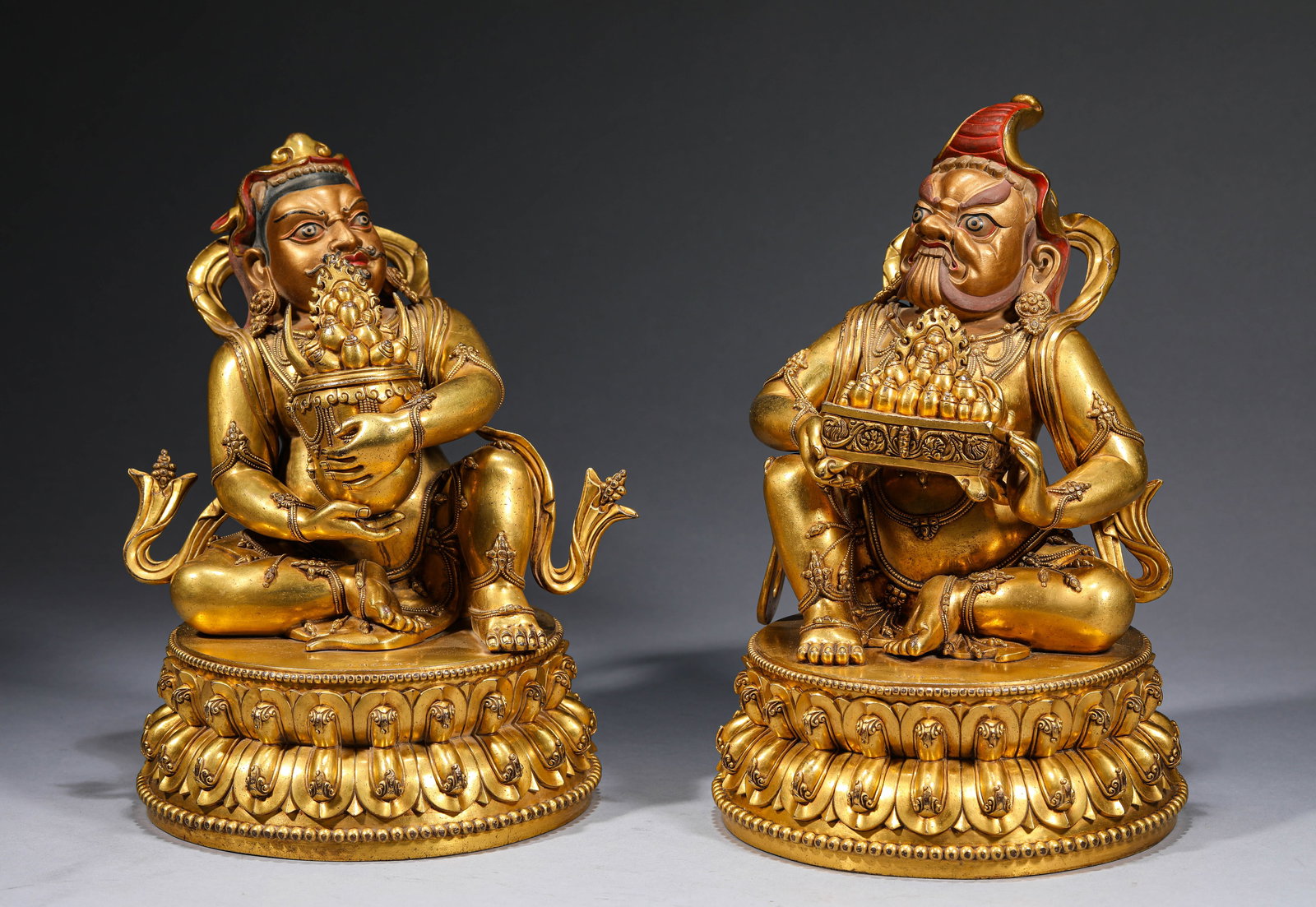 A 'VOTIVE' JAMBHALA: A 'VOTIVE' JAMBHALA Dimensions: Weight: 15.1kg. Length: 22.9 cm (9.02 in) x Width: 20.1 cm (7.91 in) x Height: 30.0 cm (11.81 in). Width: 20.7 cm (8.15 in) x Height: 31.5 cm (12.40 in). All