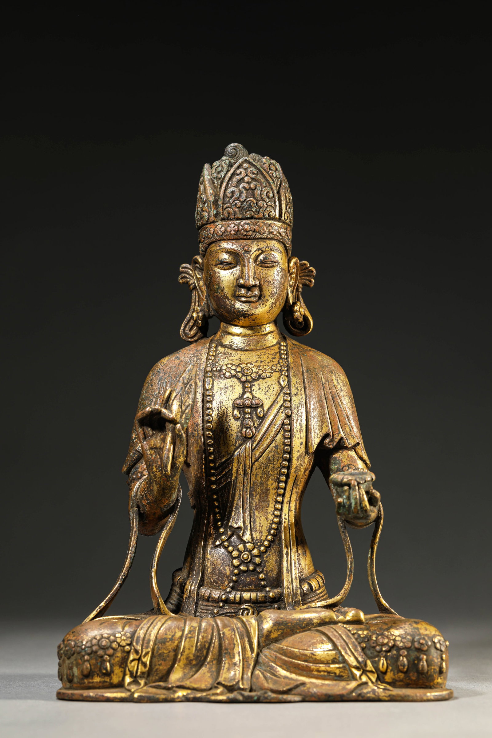 A GILT-BRONZE FIGURE OF BUDDHA (1 of 6)