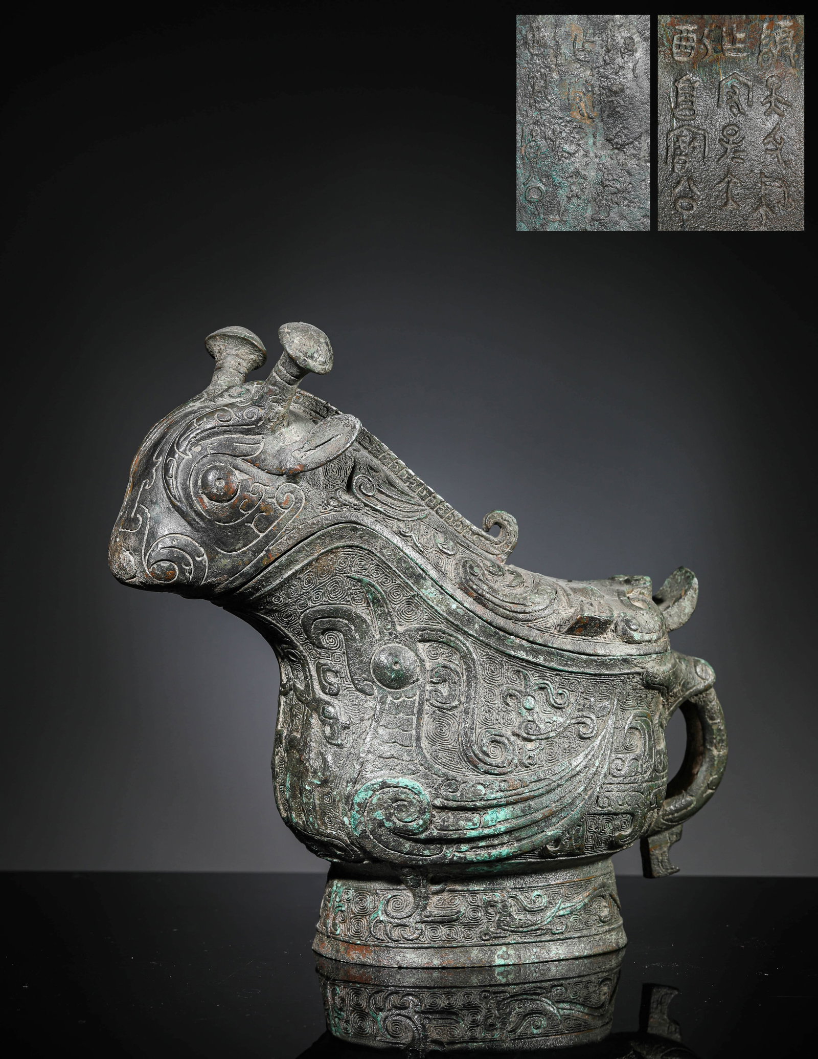 A BRONZE 'GONG' RITUAL WINE VESSEL: A BRONZE 'GONG' RITUAL WINE VESSEL Dimensions: Weight: 3.95kg. Length: 28.1 cm (11.06 in) x Width: 11.1 cm (4.37 in) x Height: 25.5 cm (10.04 in). All measurements are approximate.