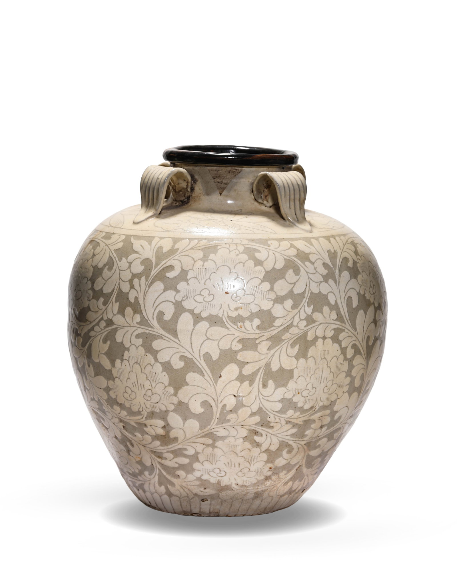 A CIZHOU-TYPE 'CARVED FLORAL' 'FOUR-LUG' JAR: A CIZHOU-TYPE 'CARVED FLORAL' 'FOUR-LUG' JAR Dimensions: Width: 36.6 cm (14.41 in) x Height: 42.0 cm (16.54 in). All measurements are approximate.