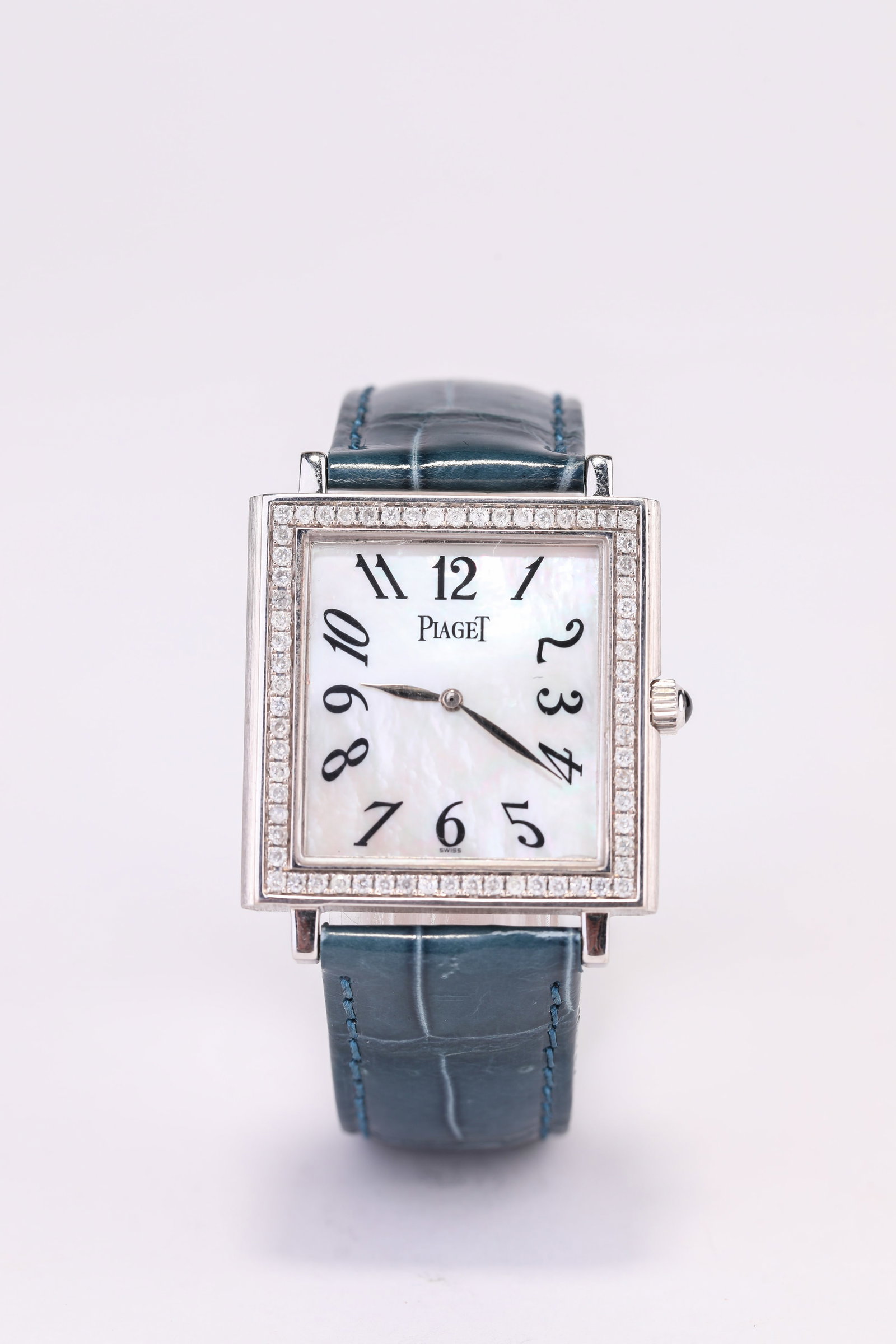 A PIAGET 18K WHITE GOLD DIAMOND-SET MANUAL-WIND ULTRA-THIN STEEL WATCH: A PIAGET 18K WHITE GOLD DIAMOND-SET MANUAL-WIND ULTRA-THIN STEEL WATCH Dimensions: Length: 2.9 cm (1.14 in) x Width: 3.1 cm (1.22 in). All measurements are approximate.