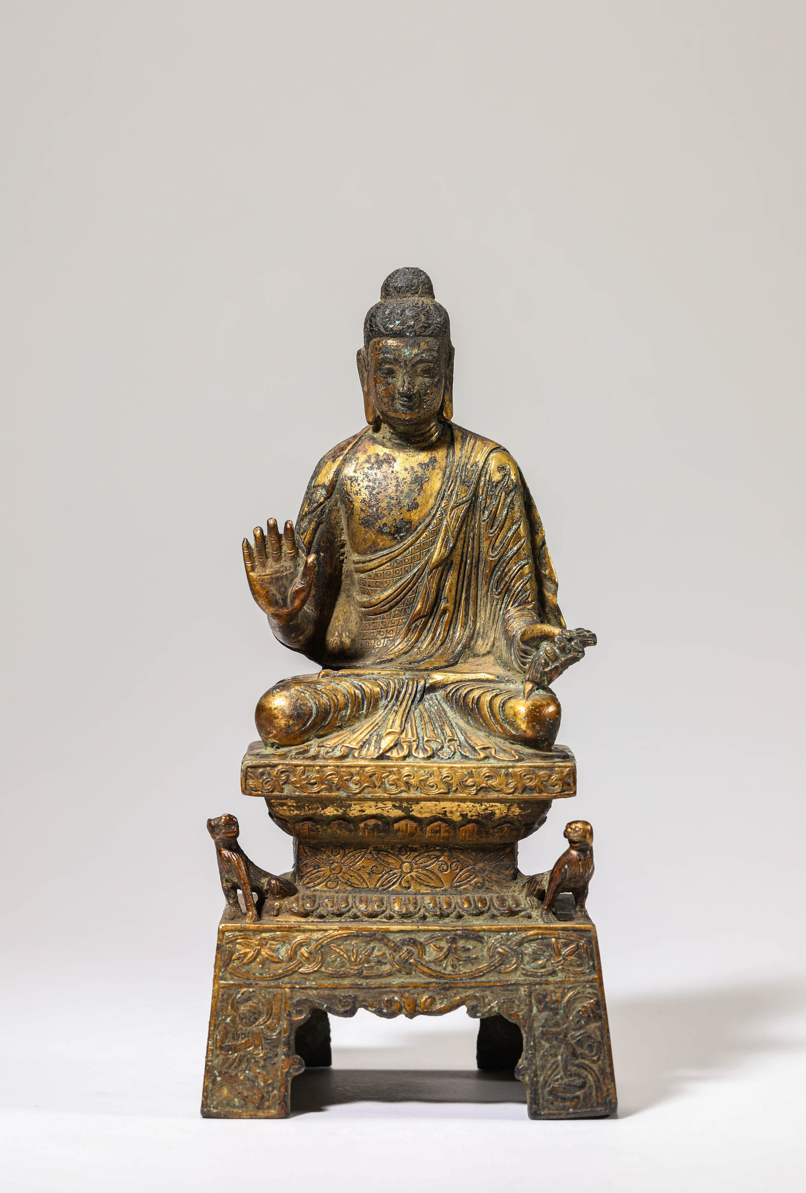 A GILT-BRONZE FIGURE OF BUDDHA (1 of 6)