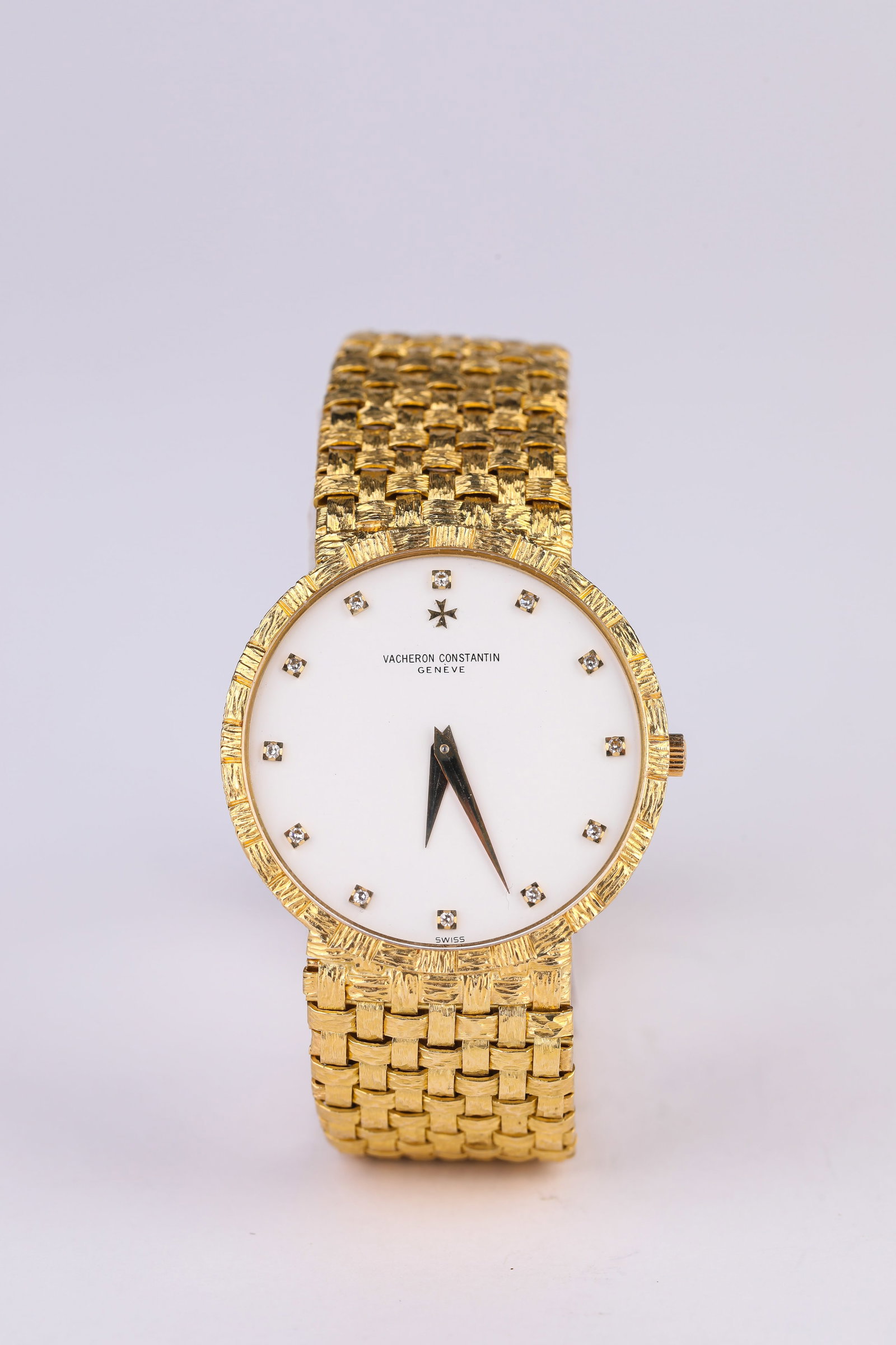 A VACHERON CONSTANTIN 18K GOLD DIAMOND-SET MECHANICAL WRISTWATCH: A VACHERON CONSTANTIN 18K GOLD DIAMOND-SET MECHANICAL WRISTWATCH Dimensions: Width: 3.2 cm (1.26 in). All measurements are approximate.
