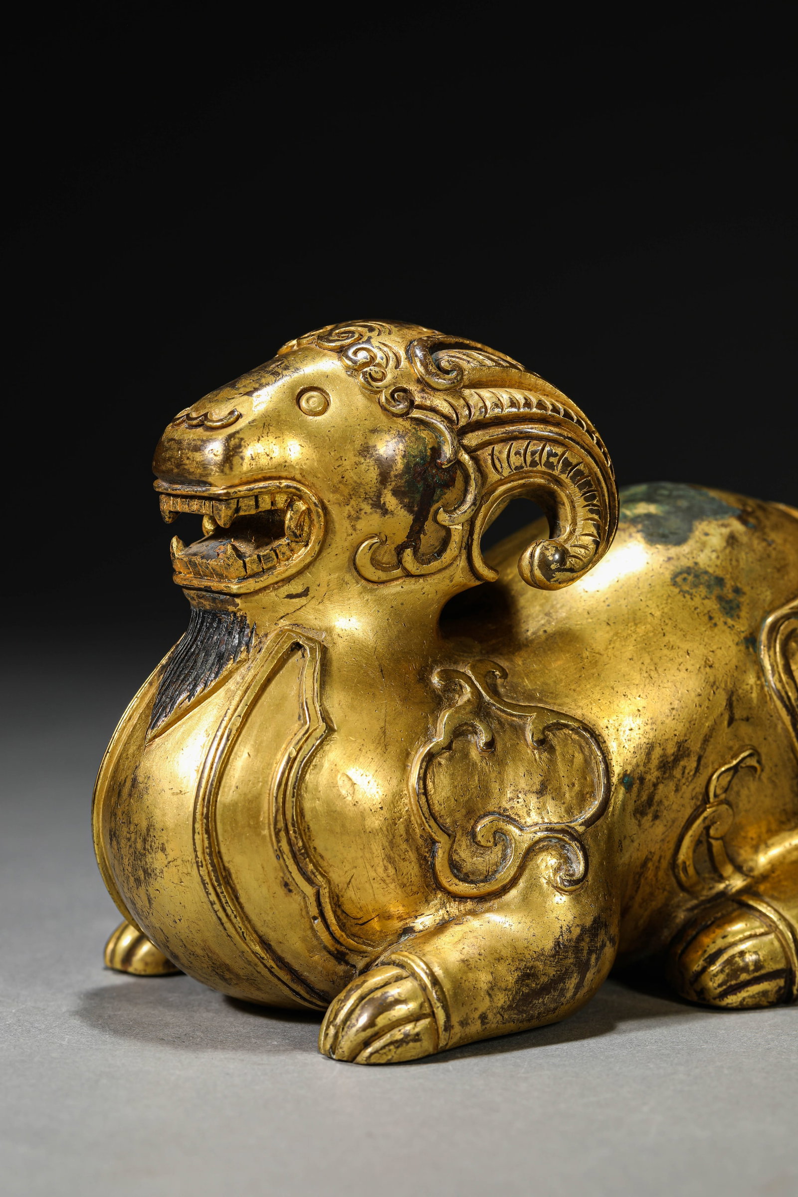 A GILT-BRONZE RAM - 2