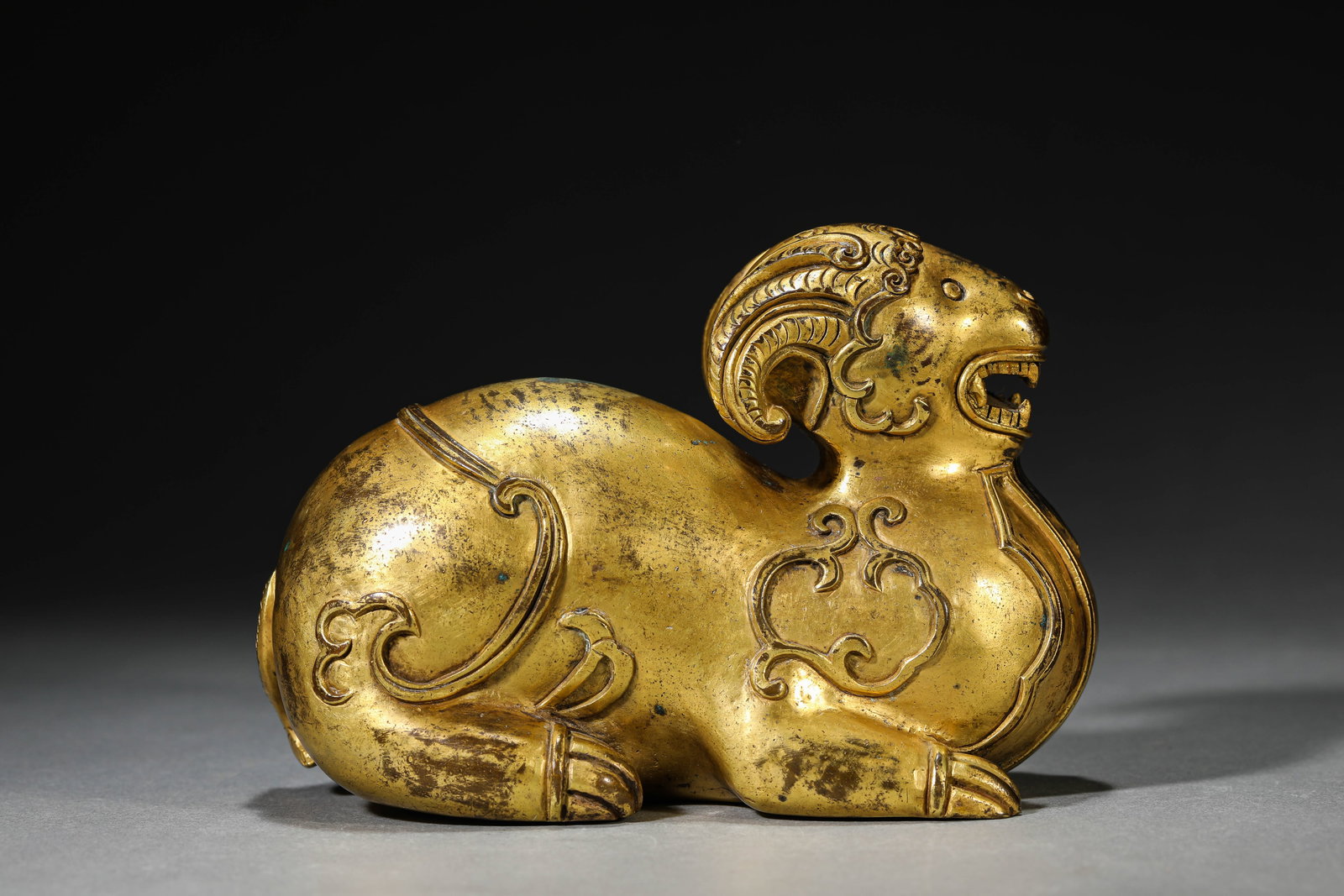 A GILT-BRONZE RAM - 3