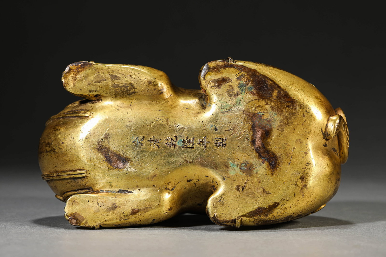 A GILT-BRONZE RAM - 5