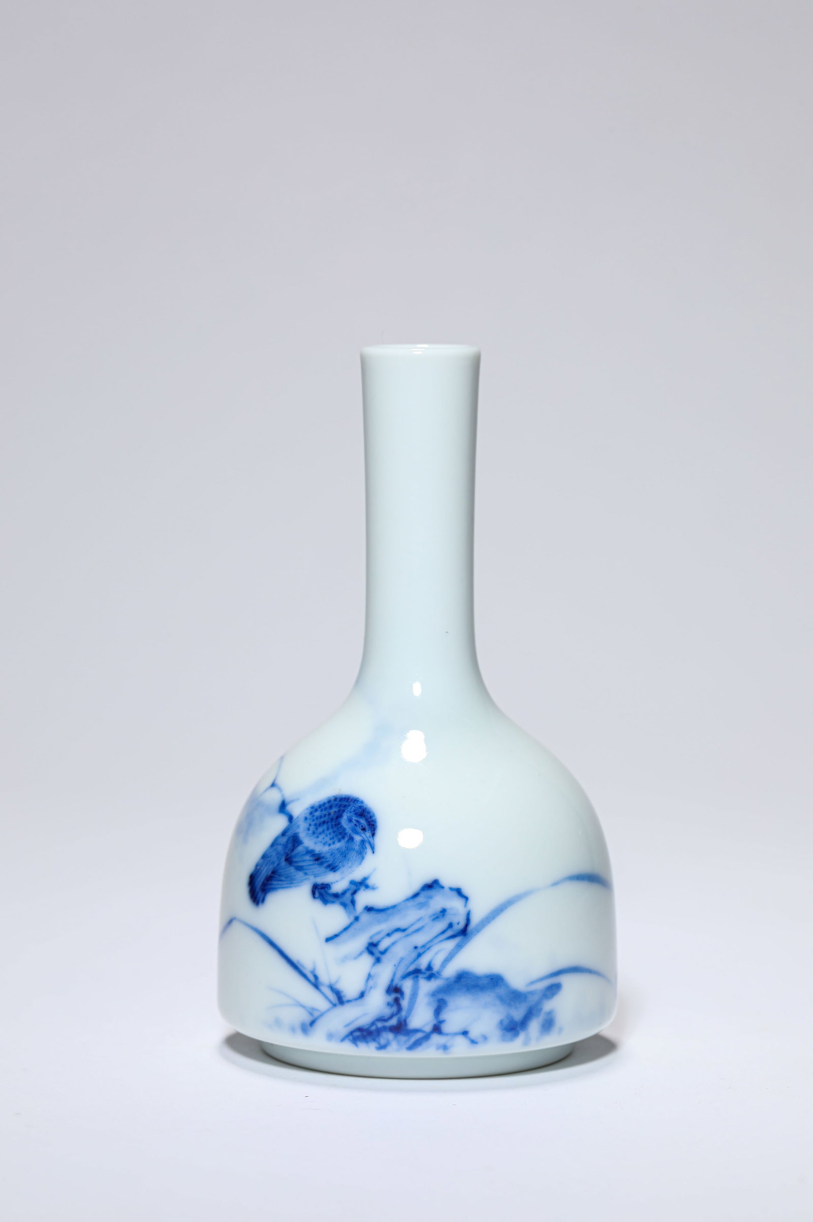 A BLUE AND WHITE 'FLOWERS AND BIRDS' VASE: A BLUE AND WHITE 'FLOWERS AND BIRDS' VASE Dimensions: Width: 6.5 cm (2.56 in) x Height: 11.5 cm (4.53 in). All measurements are approximate.