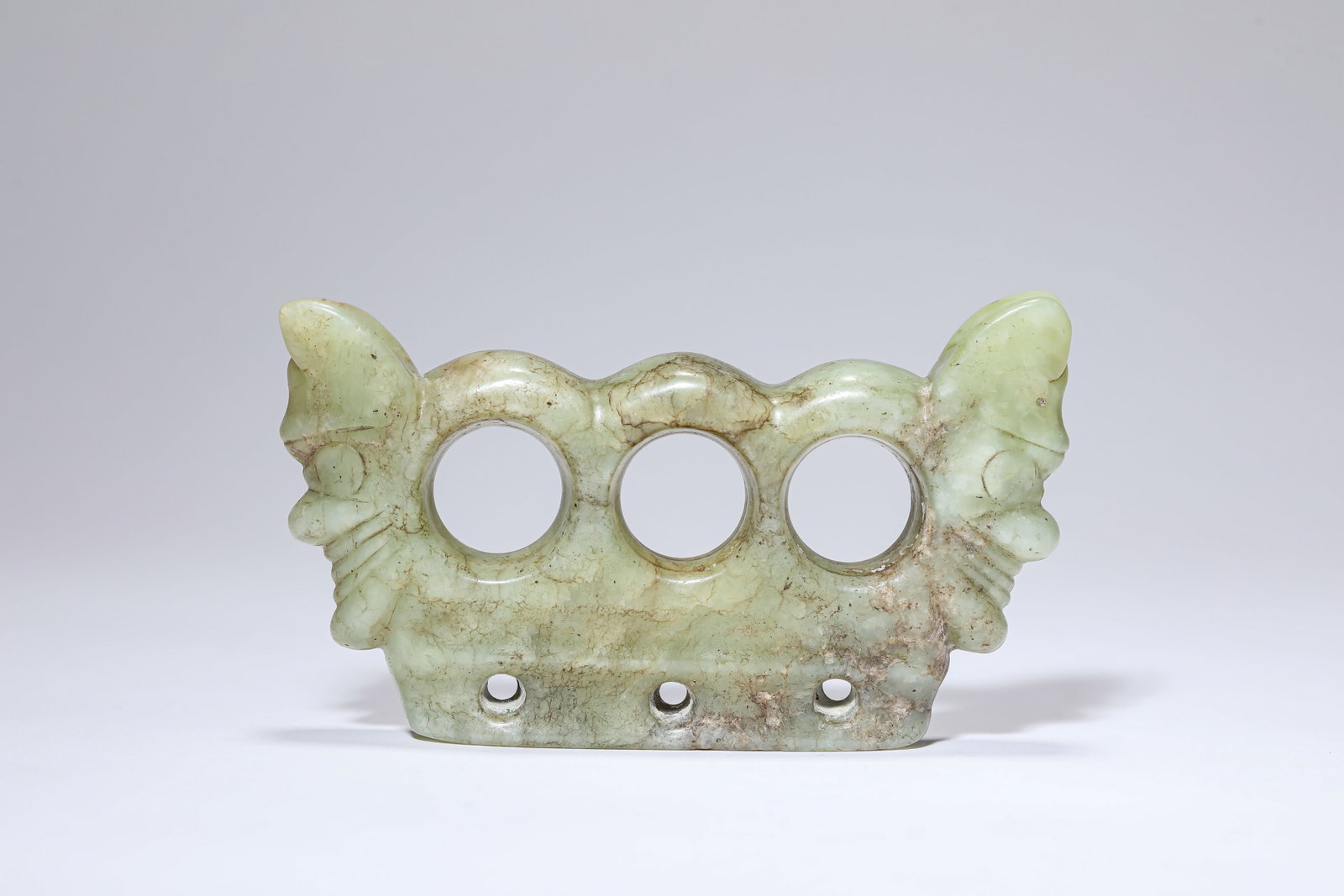 A JADE 'THREE-HOLED' OBJECT - 3
