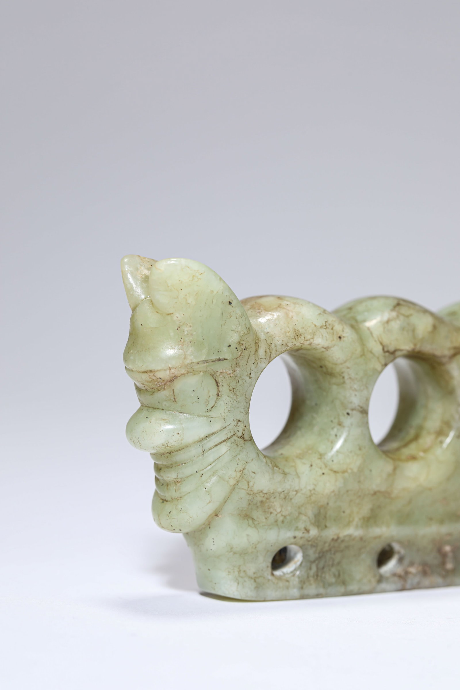 A JADE 'THREE-HOLED' OBJECT - 4