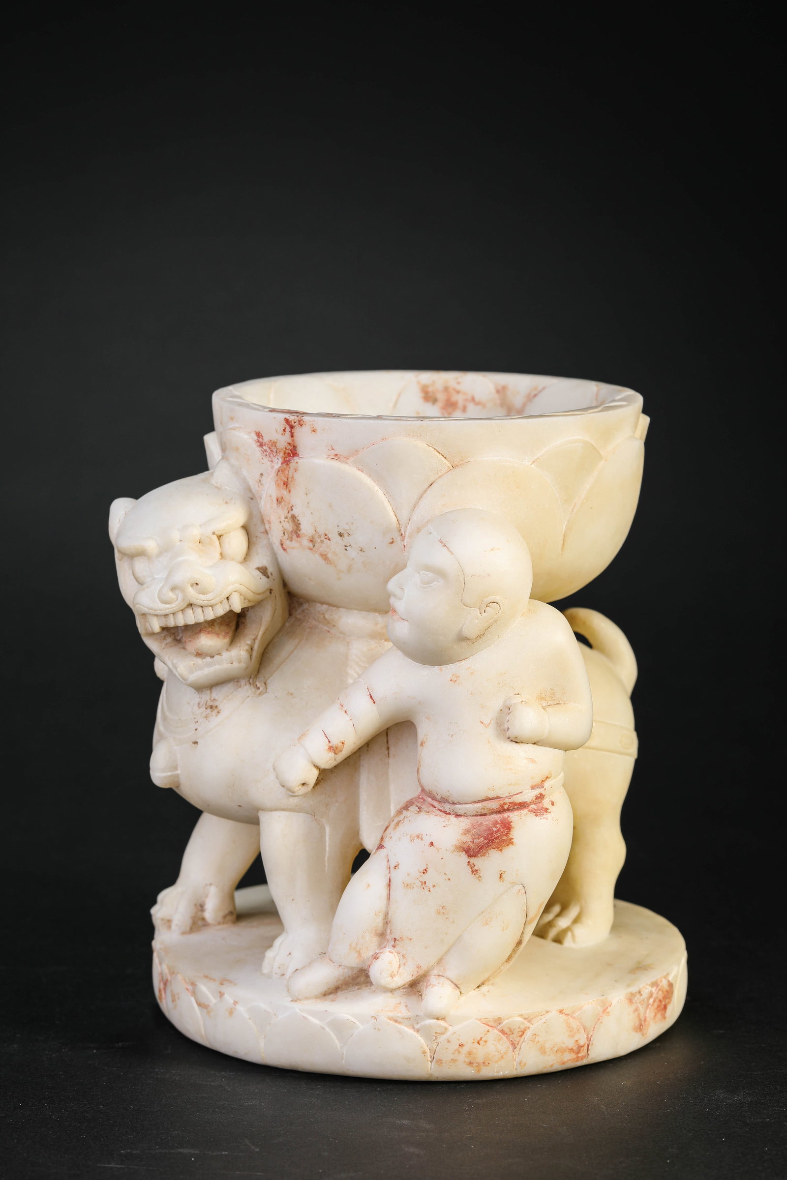 A WHITE MARBLE LAMP STAND: A WHITE MARBLE LAMP STAND Dimensions: Length: 16.2 cm (6.38 in) x Width: 15.6 cm (6.14 in) x Height: 18.5 cm (7.28 in). All measurements are approximate.