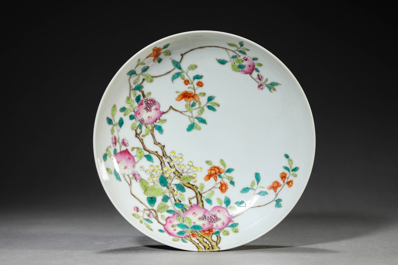 A FAMILLE-ROSE 'LONGEVITY' DISH: A FAMILLE-ROSE 'LONGEVITY' DISH Dimensions: Width: 17.4 cm (6.85 in) x Height: 4.2 cm (1.65 in). All measurements are approximate.